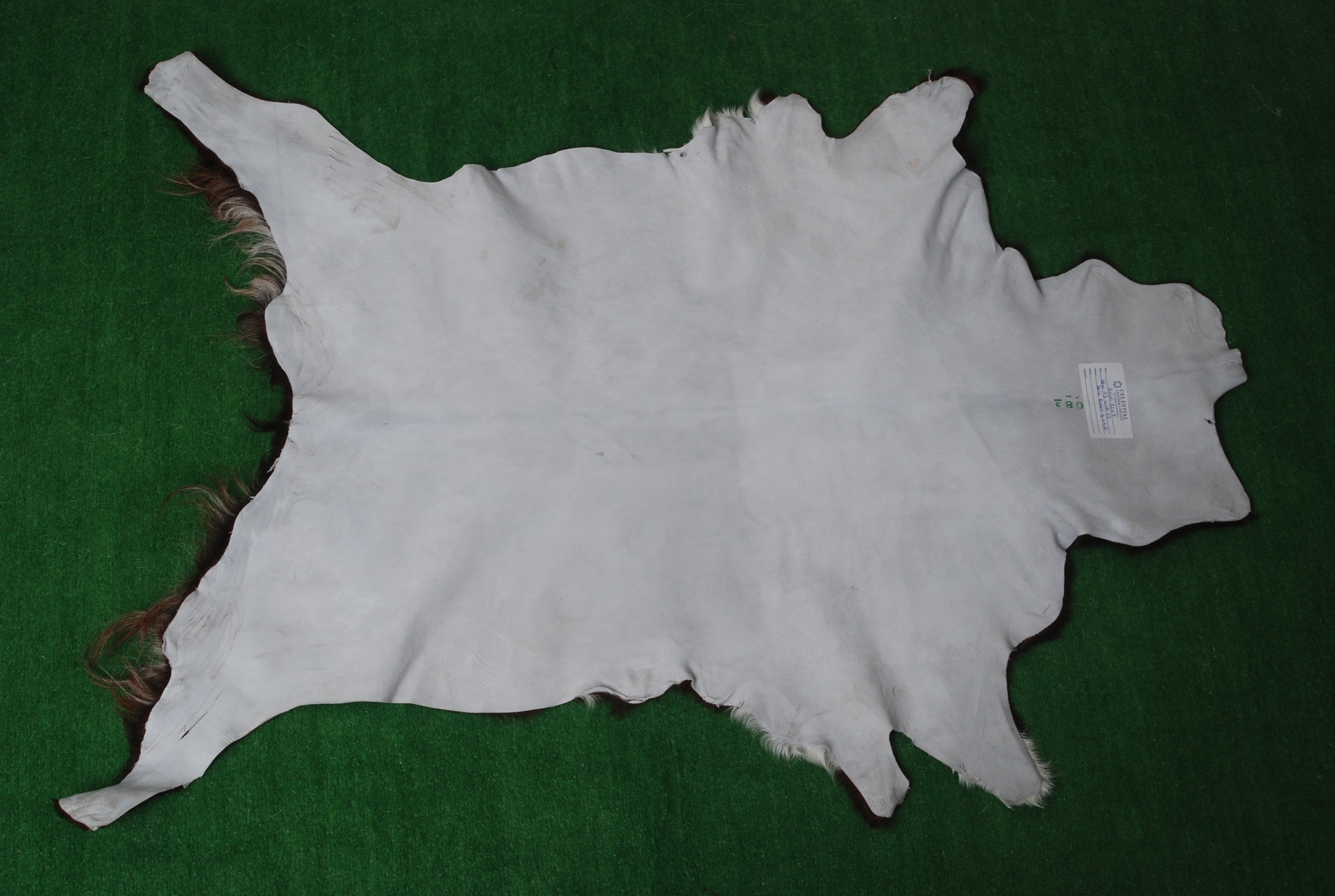 Stylish Black and White Goat Hide Rug - Unique Natural Pattern for Modern Homes