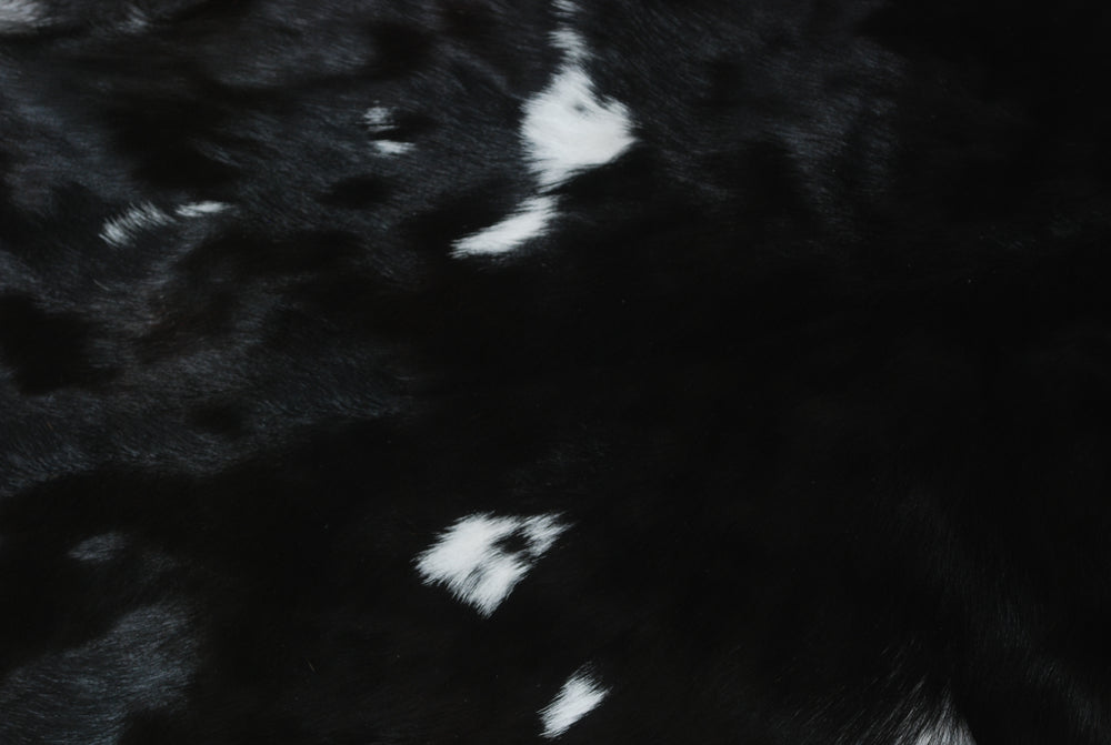 Luxury Black & White Goat Skin Floor Rug - Soft, Durable, and Eco-Friendly - Stylish Decor Accent for High-Traffic Areas - Celestial Leather Limited