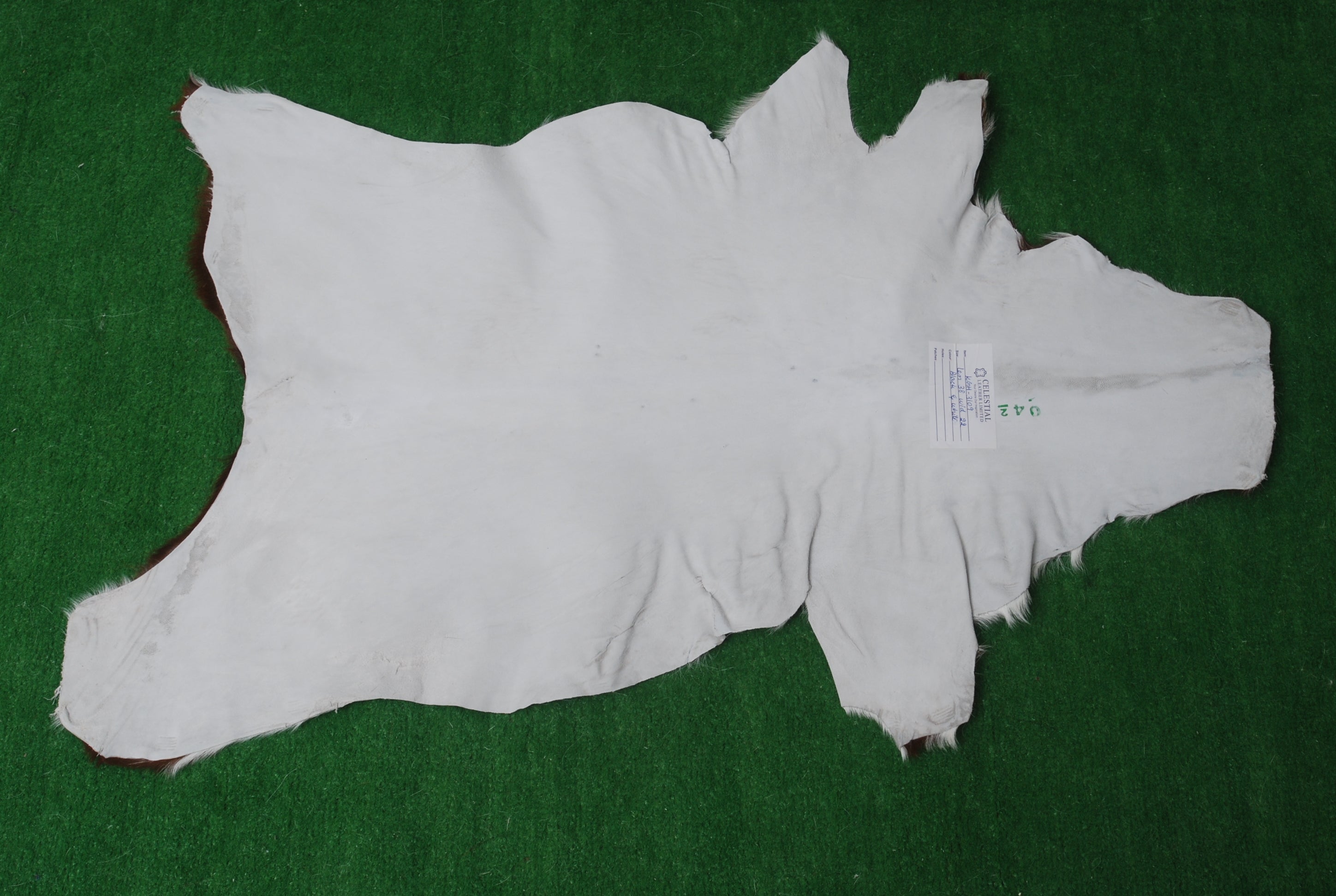 Handcrafted Tri-Color Goat Skin Rug - Soft and Durable for Elegant Interiors