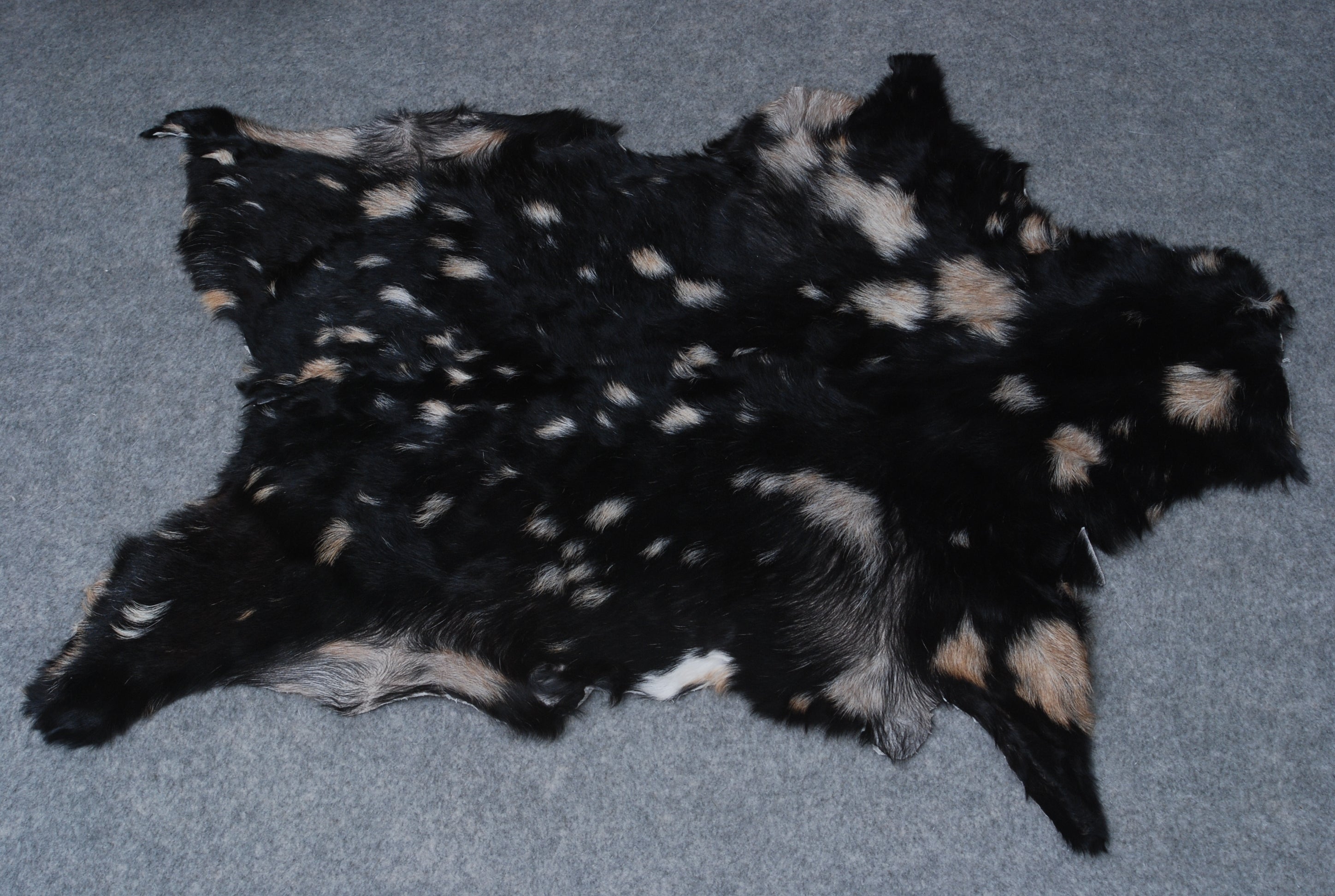 Handcrafted Black and White Goat Skin Rug - Soft and Durable Hair-On Leather