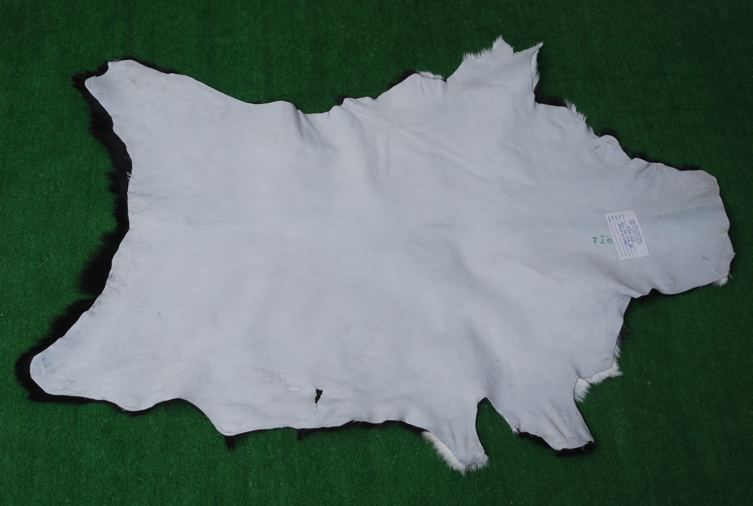 Luxury Black & White Goat Skin Rug - Soft, Durable, and Eco-Friendly Rug with Non-Slip Backing for Home Décor - Celestial Leather Limited