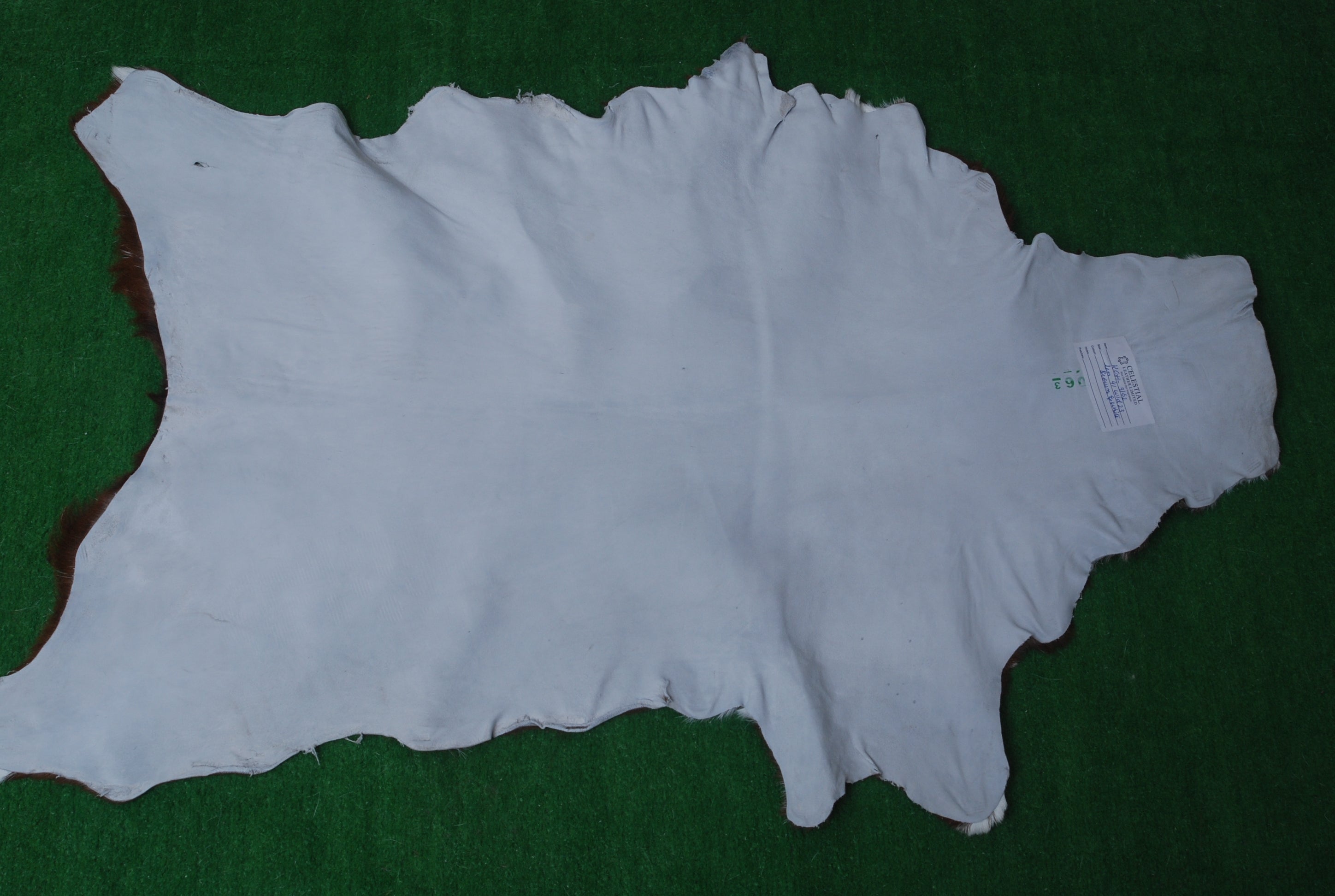 Premium Dark Brown Goat Hide Rug - Soft and Durable for Sophisticated Interiors