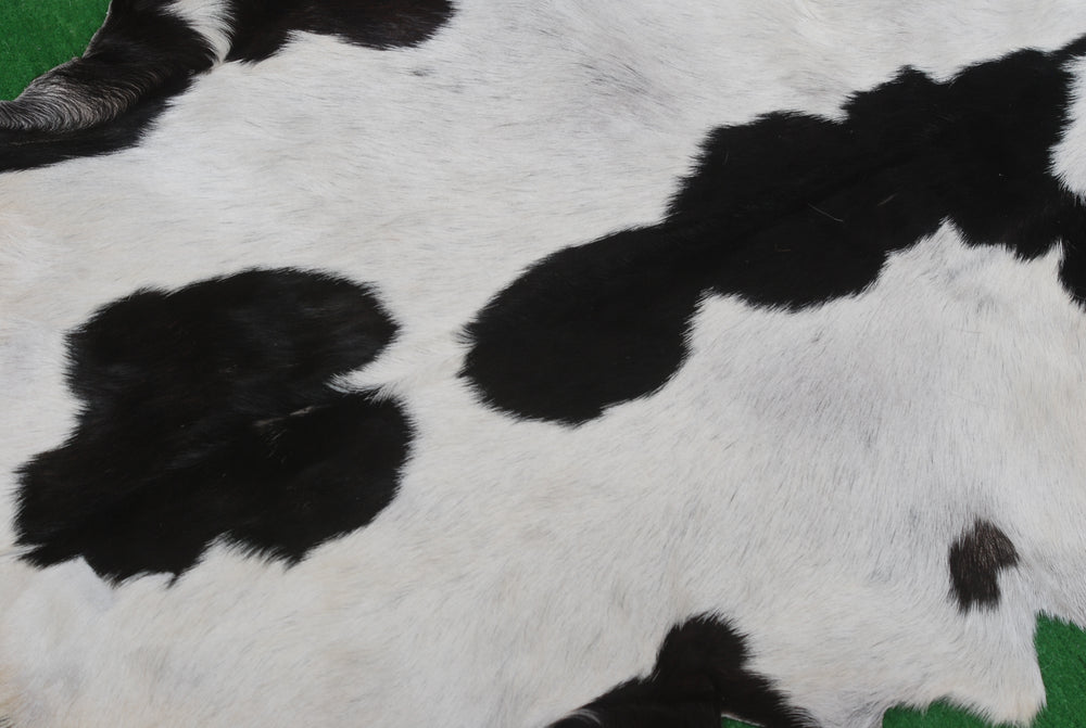 Sophisticated Black & White Goat Skin Rug - Modern Decor Accent for Home - Natural, Soft, and Unique Animal Skin Throw Rug - Celestial Leather Limited