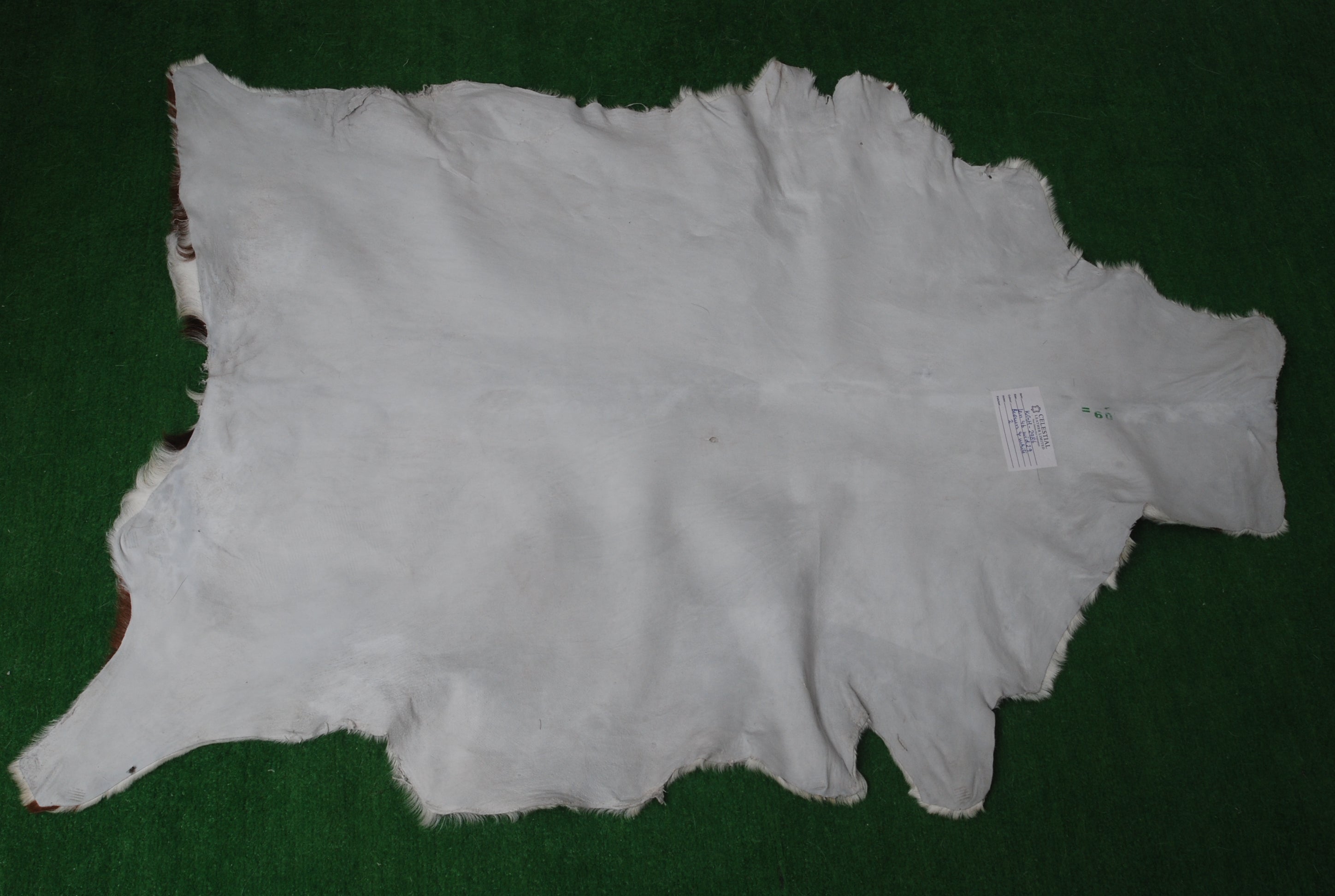 Luxurious Dark Brown Goat Skin Rug - Genuine Hair-On Leather for Elegant Décor