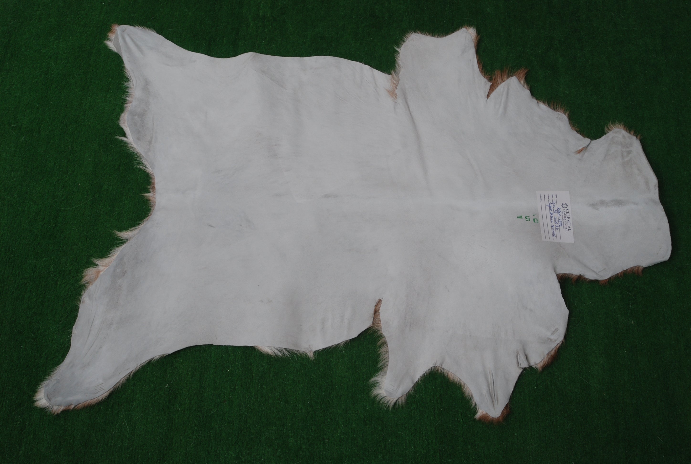 Luxury Brown and White Goat hide Rug - Premium Handcrafted Hair-on Leather Rug - Natural, Eco-Friendly, Hypoallergenic - Unique Patterns