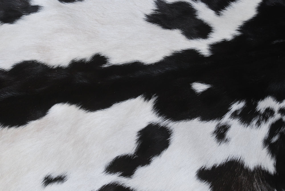 Luxury Black & White Natural Goatskin Rug - Modern Sophistication for Home Decor - Celestial Leather Limited