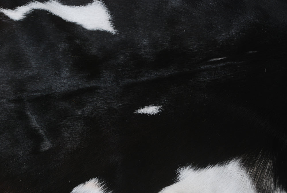 Luxurious Black & White Goat Skin Rug - Floor Décor for Home Décor - Celestial Leather Limited