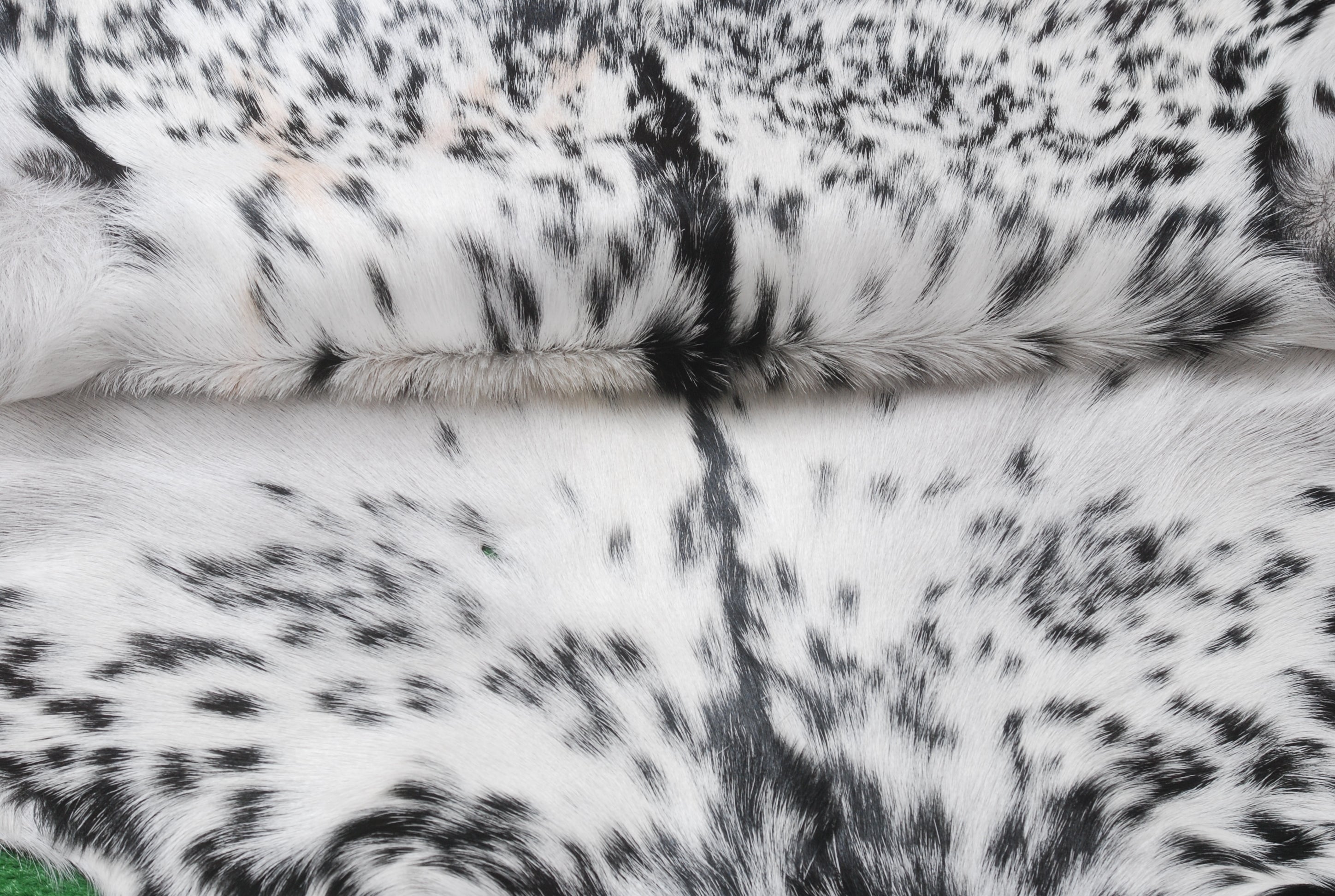 Unique Natural Black & White Goat Skin Rug - Sustainable Animal Hide Throw Floor Rug - Modern Eco-Friendly Home Décor Rug - Celestial Leather Limited