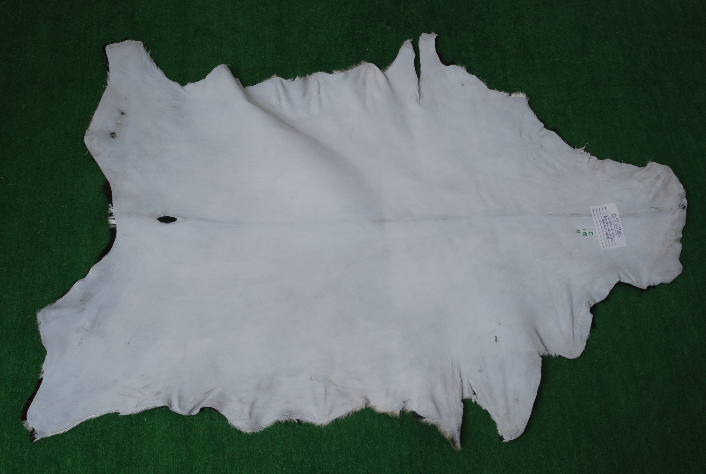 Sophisticated Black & White Goat Skin Rug - Genuine Goathide with Bold Graphic Pattern - Hypoallergenic - Non-Shedding - Eco-Friendly Floor - Celestial Leather Limited