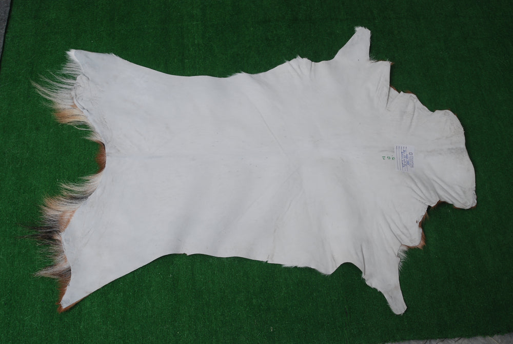 Luxurious Brown & White Goat Skin Rug - Eco-Friendly Handmade Floor Rug with Unique Variations, Soft & Hypoallergenic - Non-Shedding - Durable - Celestial Leather Limited