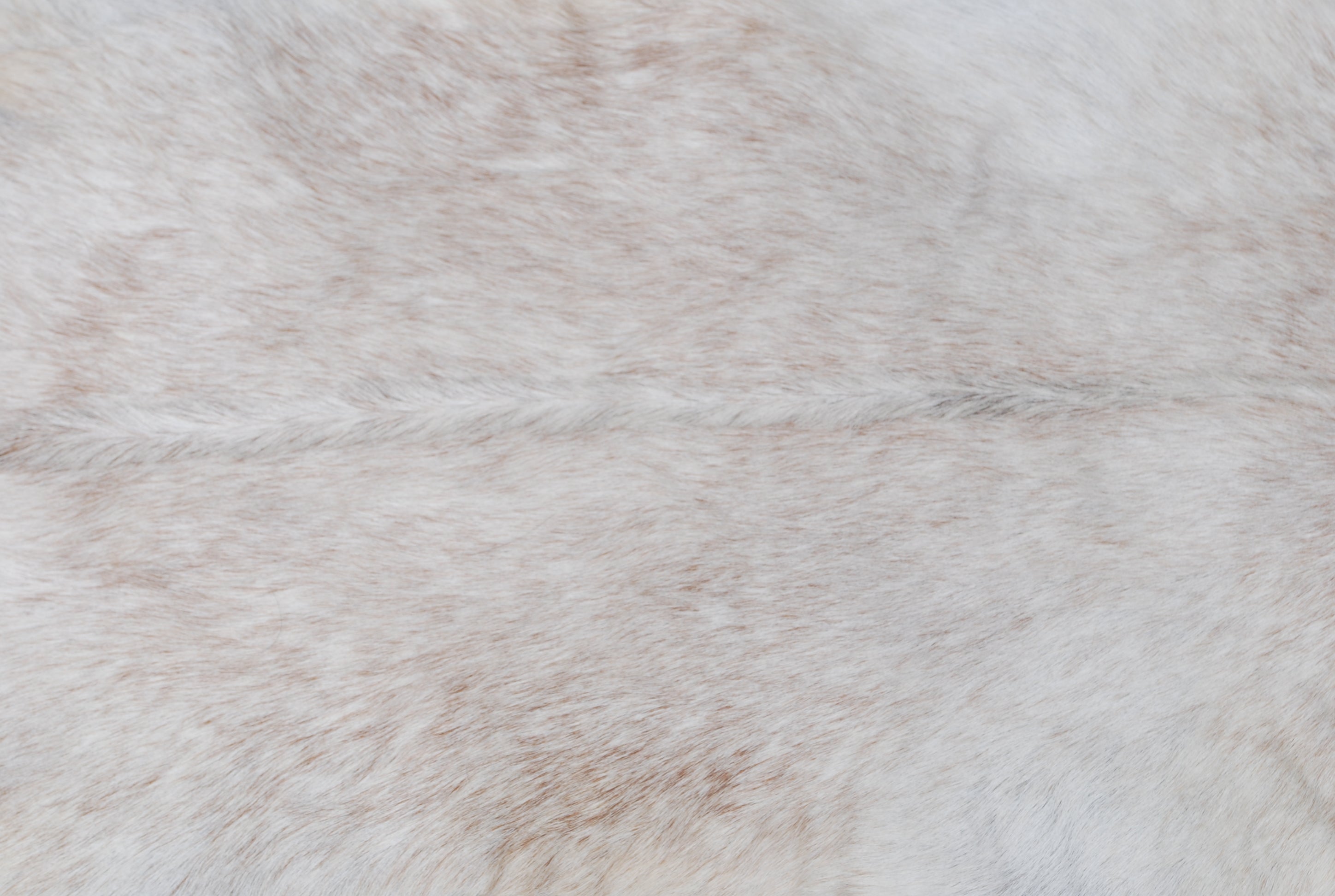 Brown and White Handmade Goat Skin Rug – Classic Elegance for Your Home