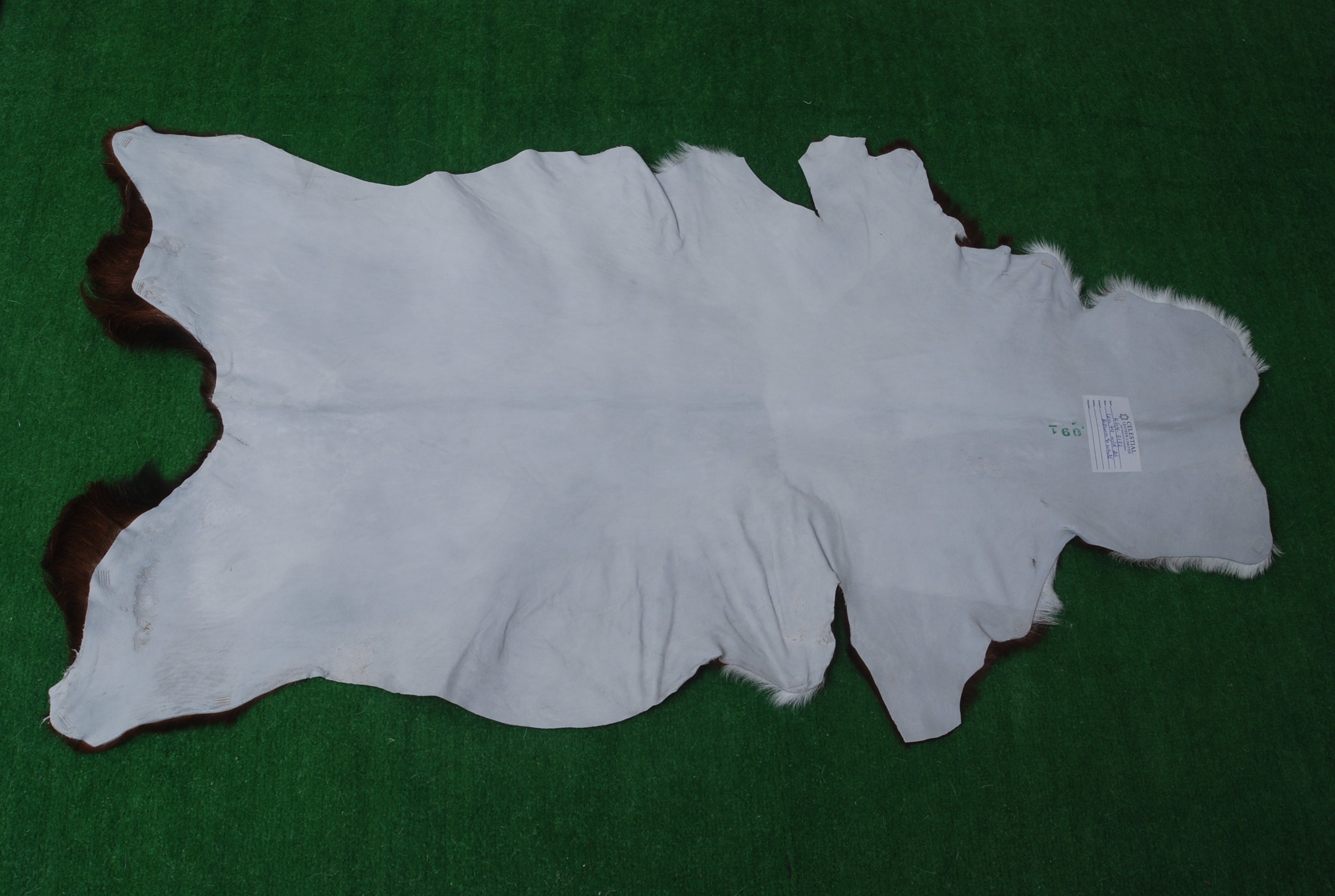 Rustic Dark Brown Goat Hide Rug - Genuine Leather for Timeless Home Styling