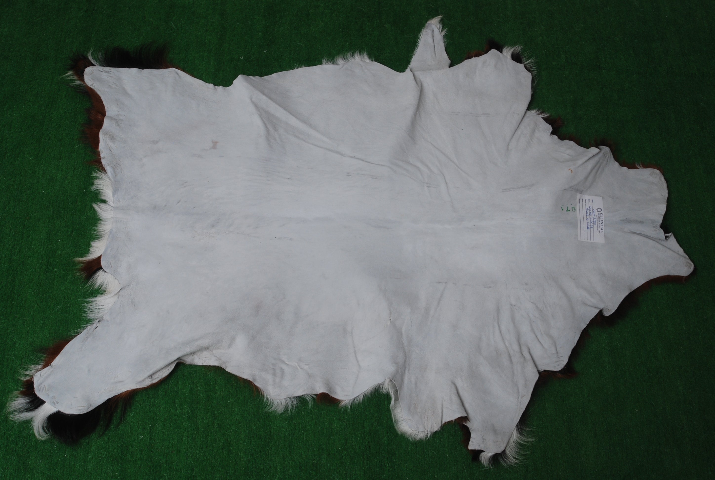 Handcrafted Black and White Goat Skin Rug - Soft and Durable Hair-On Leather