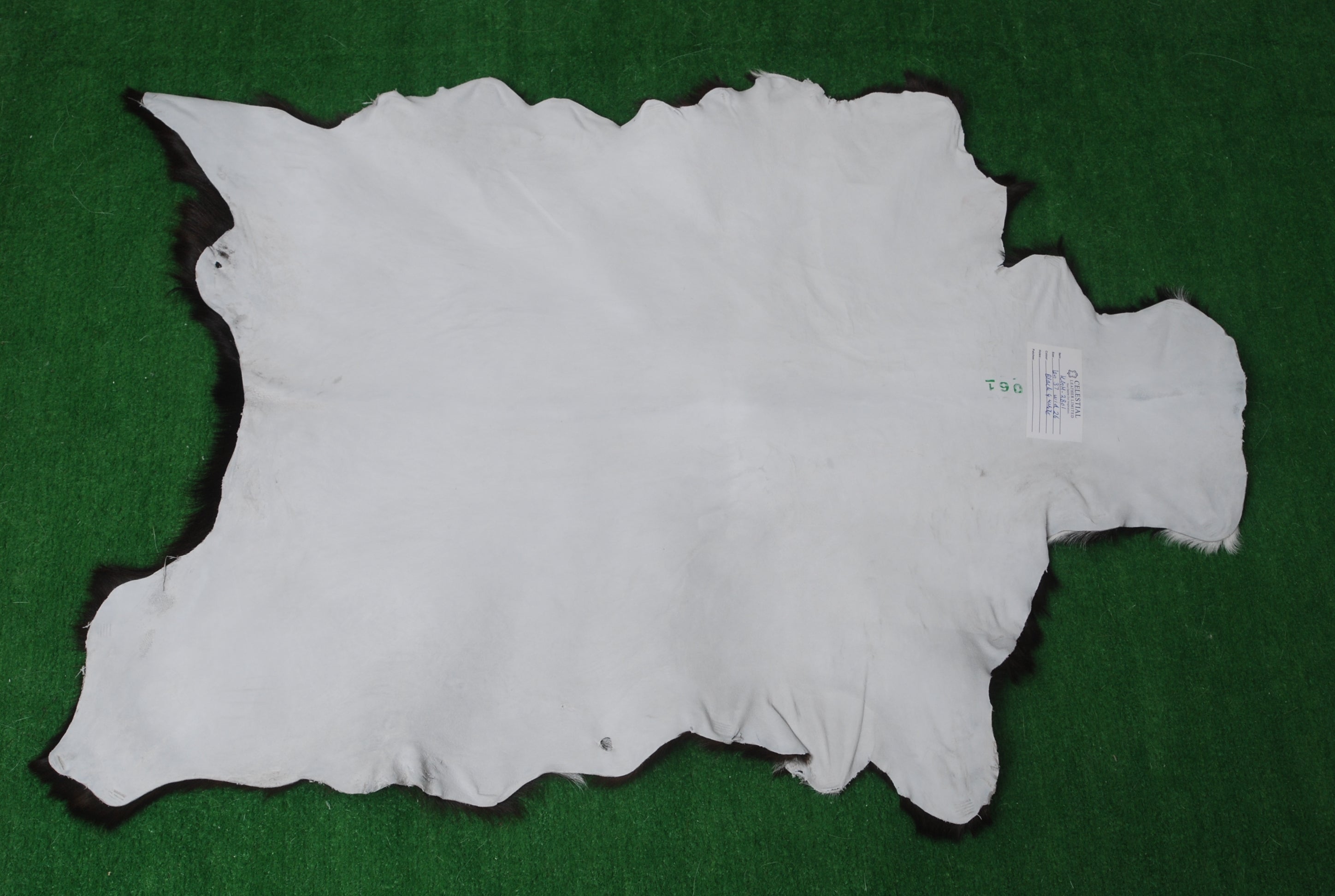 Luxury Black & White Graphic Pattern Goat Skin Rug, Hypoallergenic - Non-Shedding, Modern Sophistication, Sustainable - Eco-Friendly