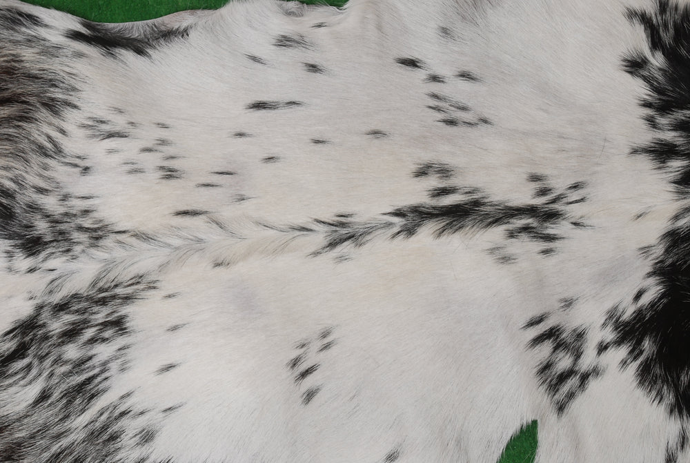 Luxurious Black & White Goat Skin Rug Perfect for Modern Spaces - Celestial Leather Limited