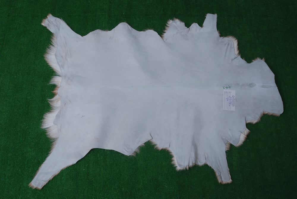 Premium Brown and White Goat Hide Rug - Natural, Handcrafted, Non-Slip Suede Back, Eco-Friendly & Sustainable - Hypoallergenic - Celestial Leather Limited