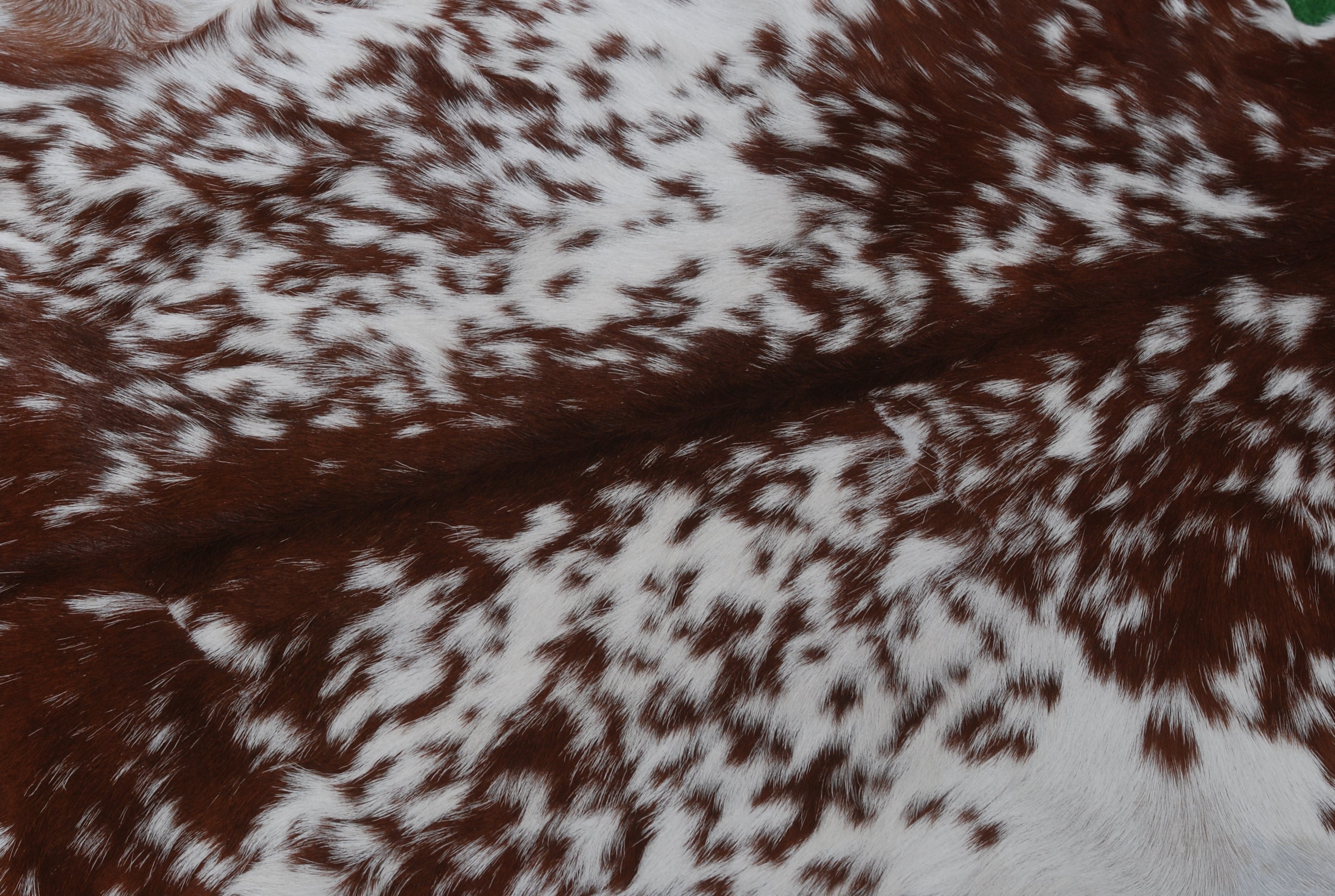 Handcrafted Dark Brown Goat Hide Rug - Soft, Natural Leather for Home Décor