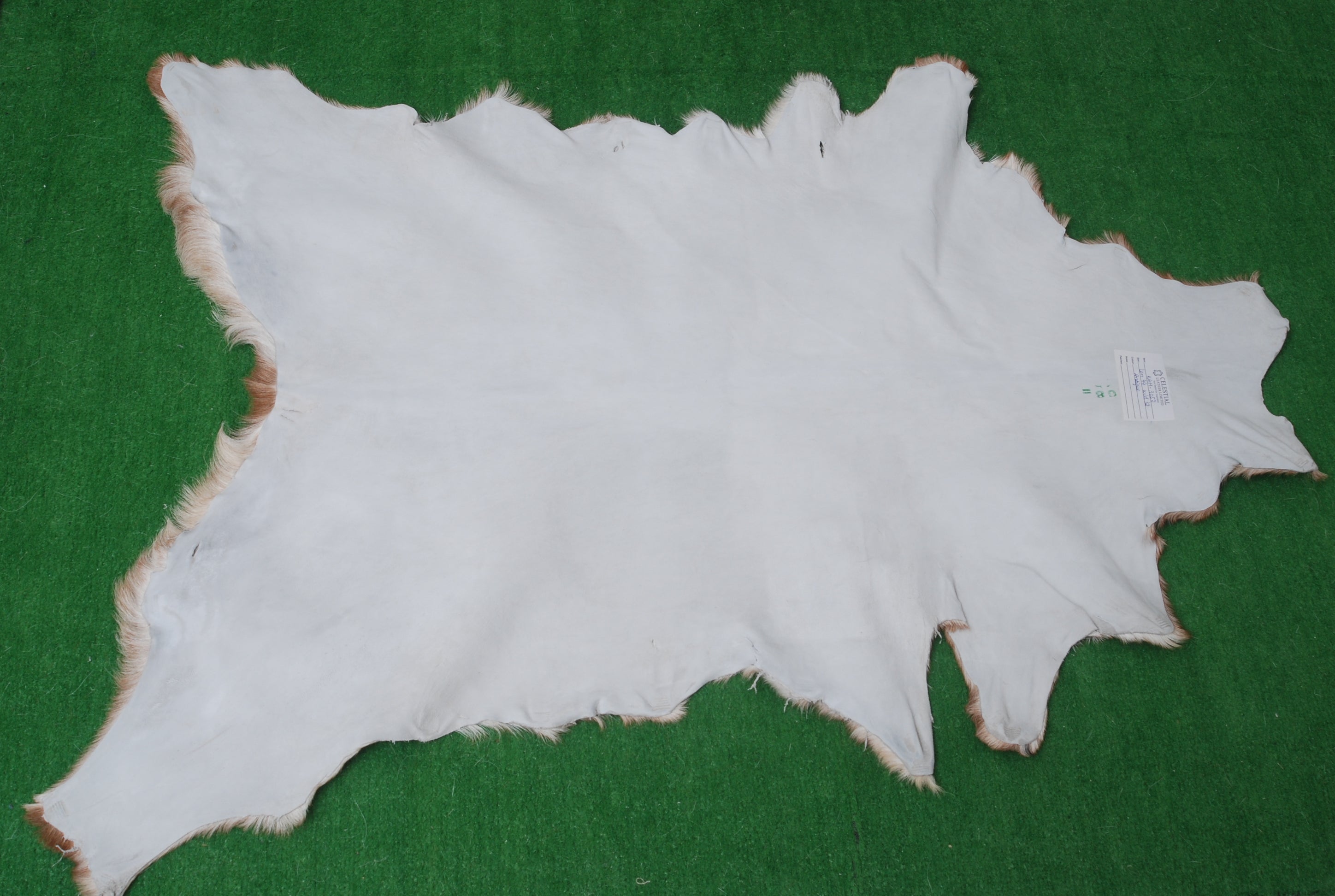 Handcrafted Dark Brown Goat Hide Rug - Soft, Natural Leather for Home Décor