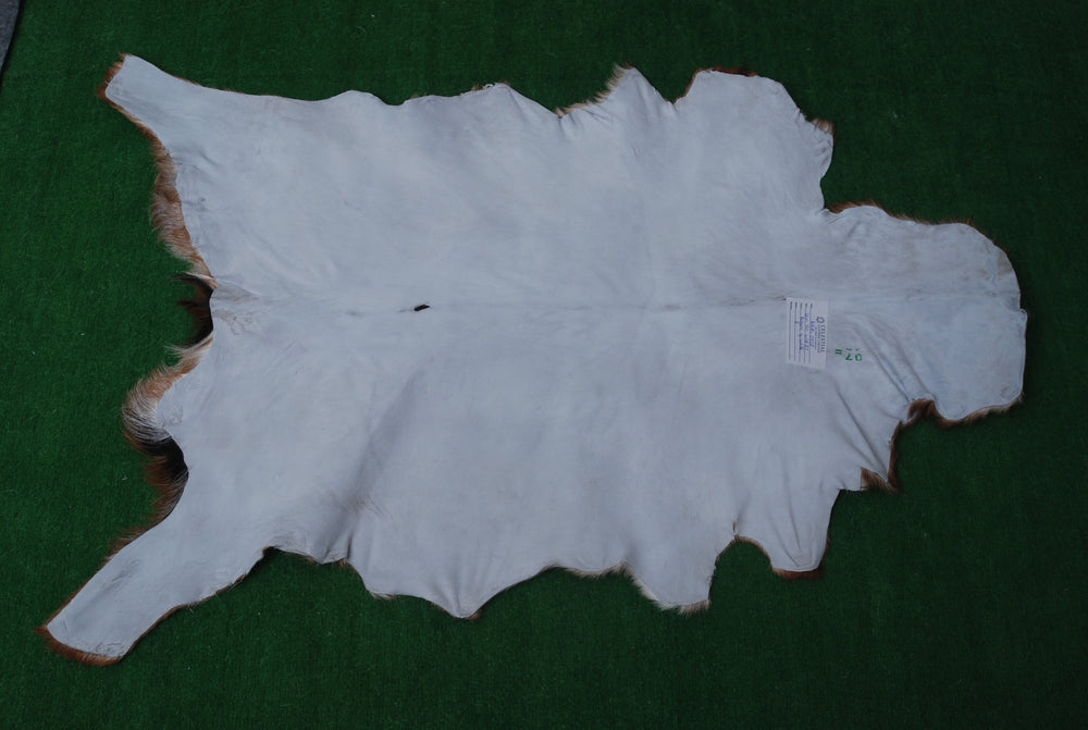 Luxurious Brown And White Goat Skin Rug - Handmade Pure Goat Skin Floor Rug with Unique Colour Variations - Celestial Leather Limited