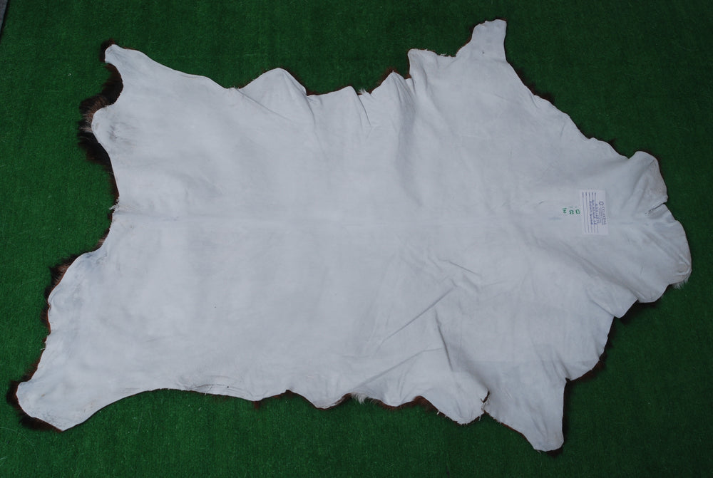 Luxury Dark Brown & White Goat Skin Rug - Durable, Hypoallergenic, Non-Shedding, Eco-Friendly - Enhance Your Home with Natural Beauty - Celestial Leather Limited