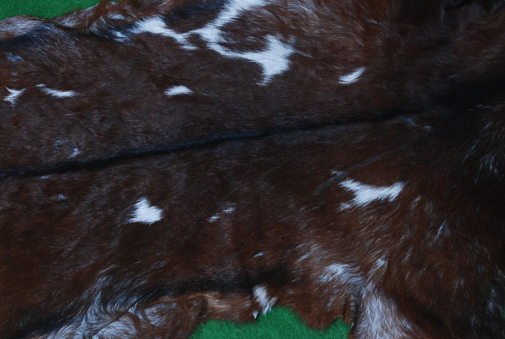 Luxury Dark Brown & White Goat Skin Rug - Durable, Hypoallergenic, Non-Shedding, Eco-Friendly - Enhance Your Home with Natural Beauty - Celestial Leather Limited