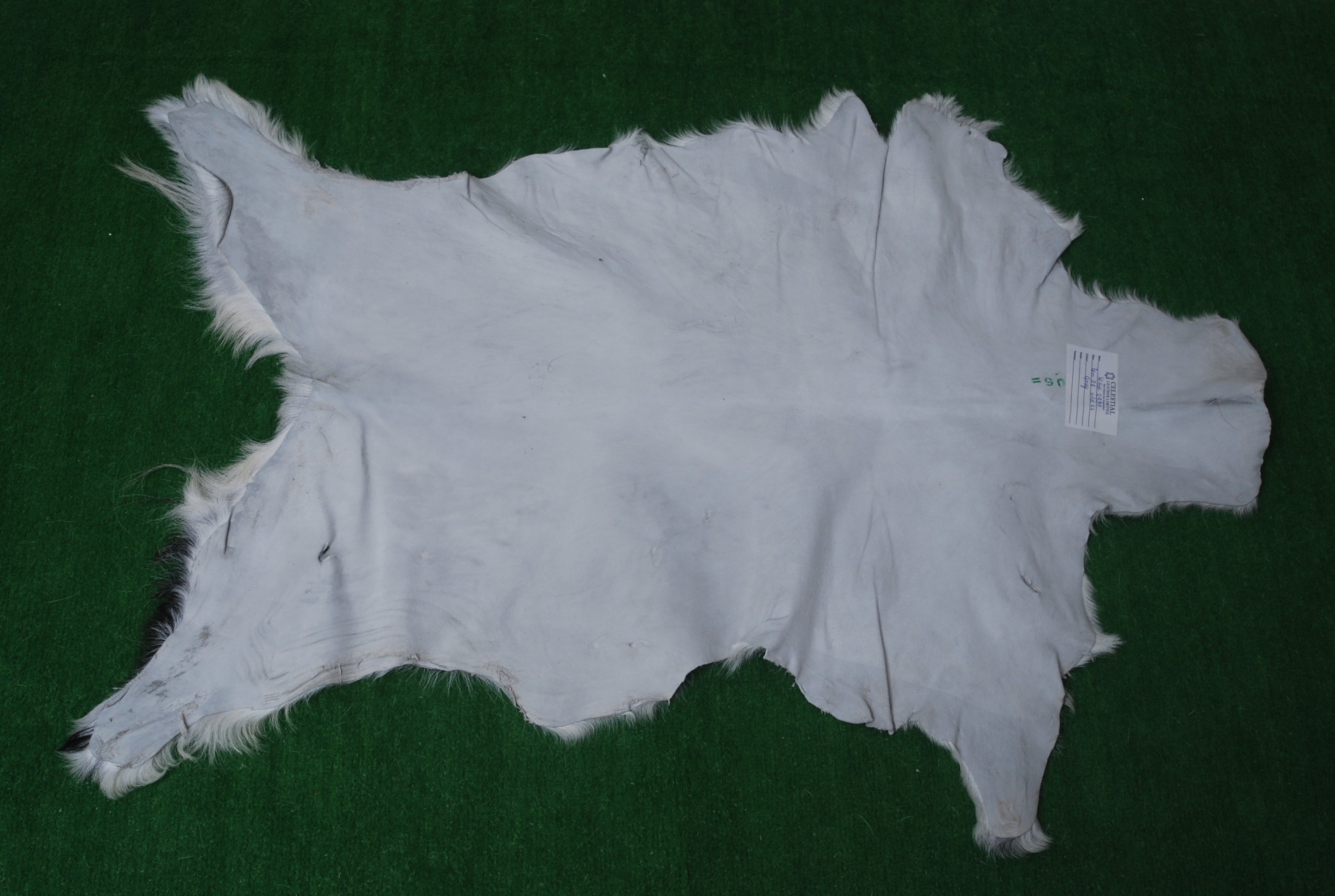 Grey and White Handmade Goat Skin Rug – Natural Luxury for Your Home