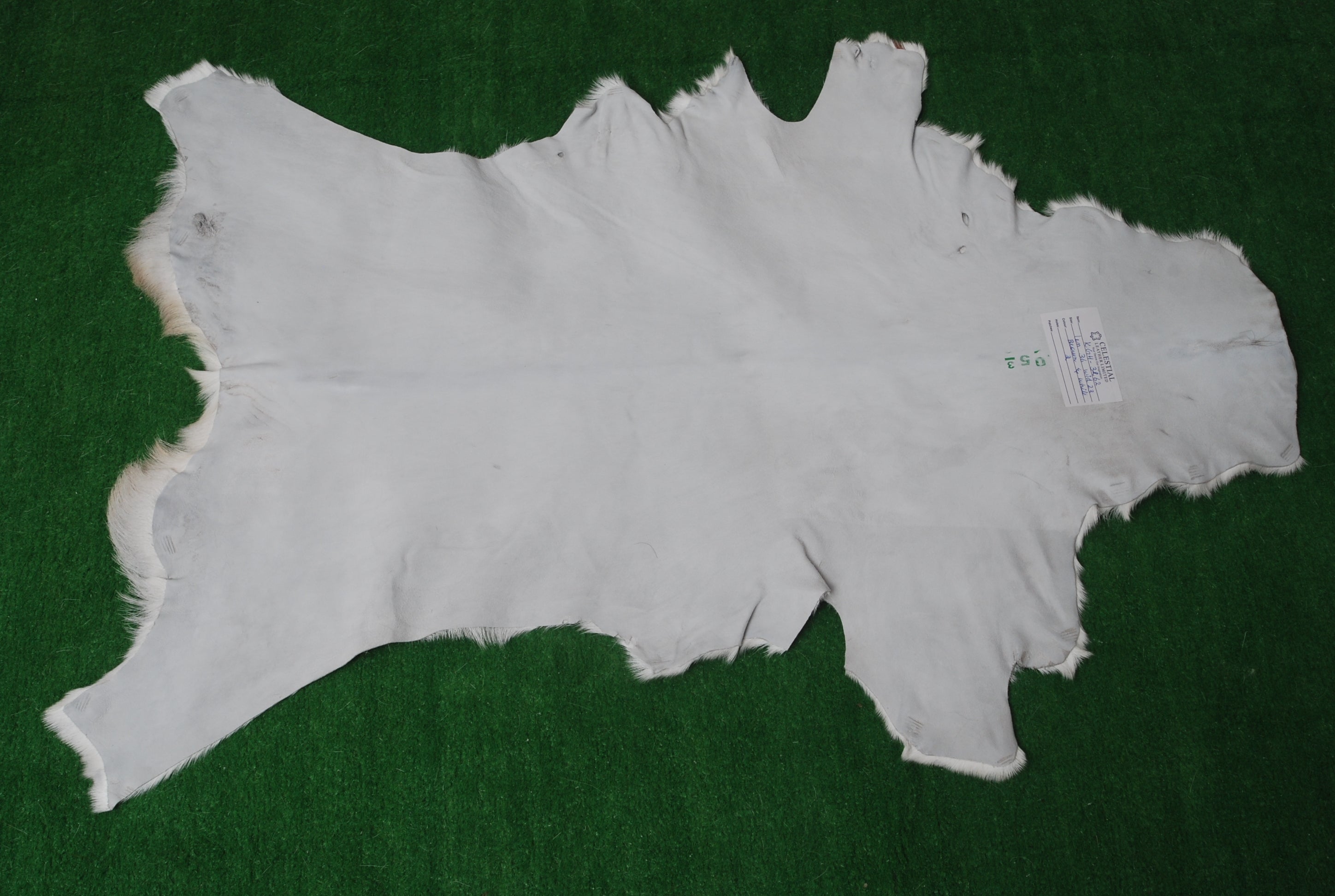 Stylish Dark Brown Goat Hide Rug - Perfect Accent for Contemporary Homes