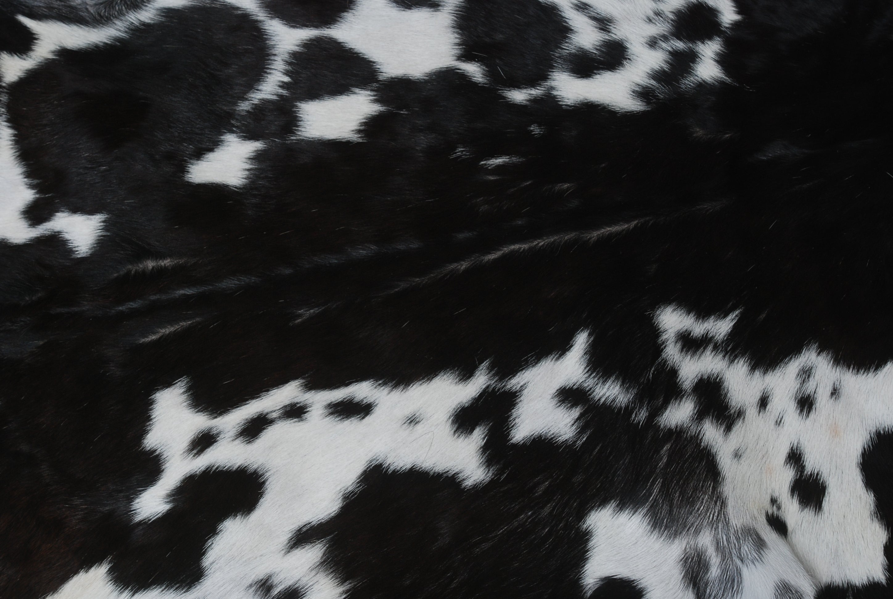 Black and White Handmade Goat Skin Rug – Rustic Charm for Your Home