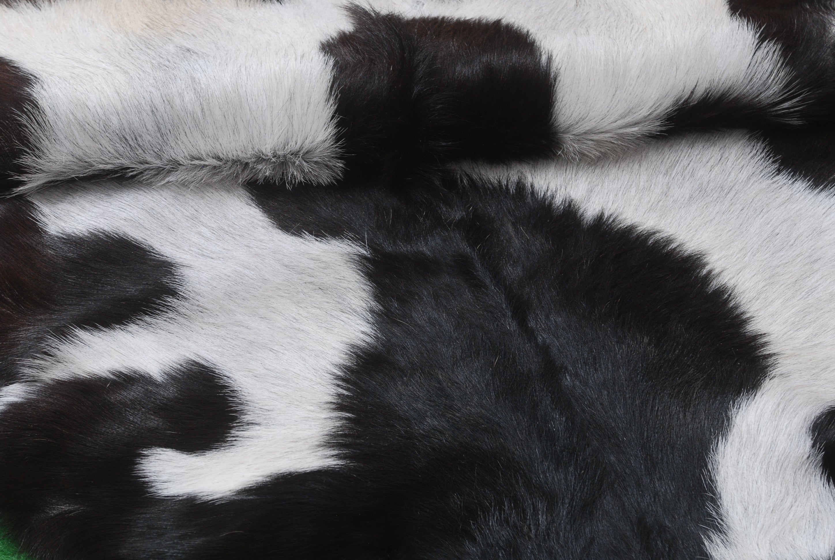Premium Black and White Goat Skin Rug - Genuine Hair-On Leather for Home Décor