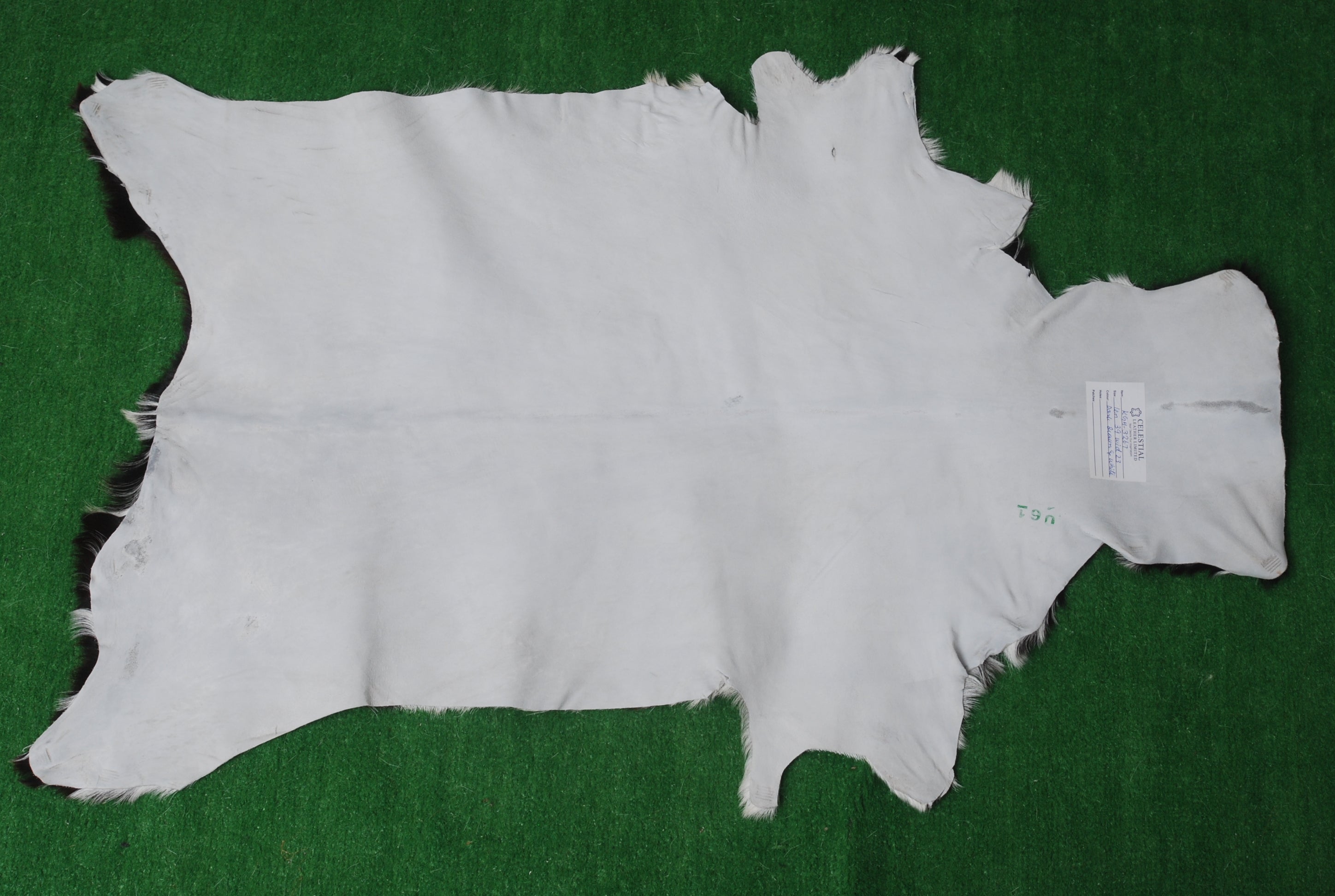 Decorative Black and White Goat Skin Rug - Genuine Leather for Sophisticated Spaces