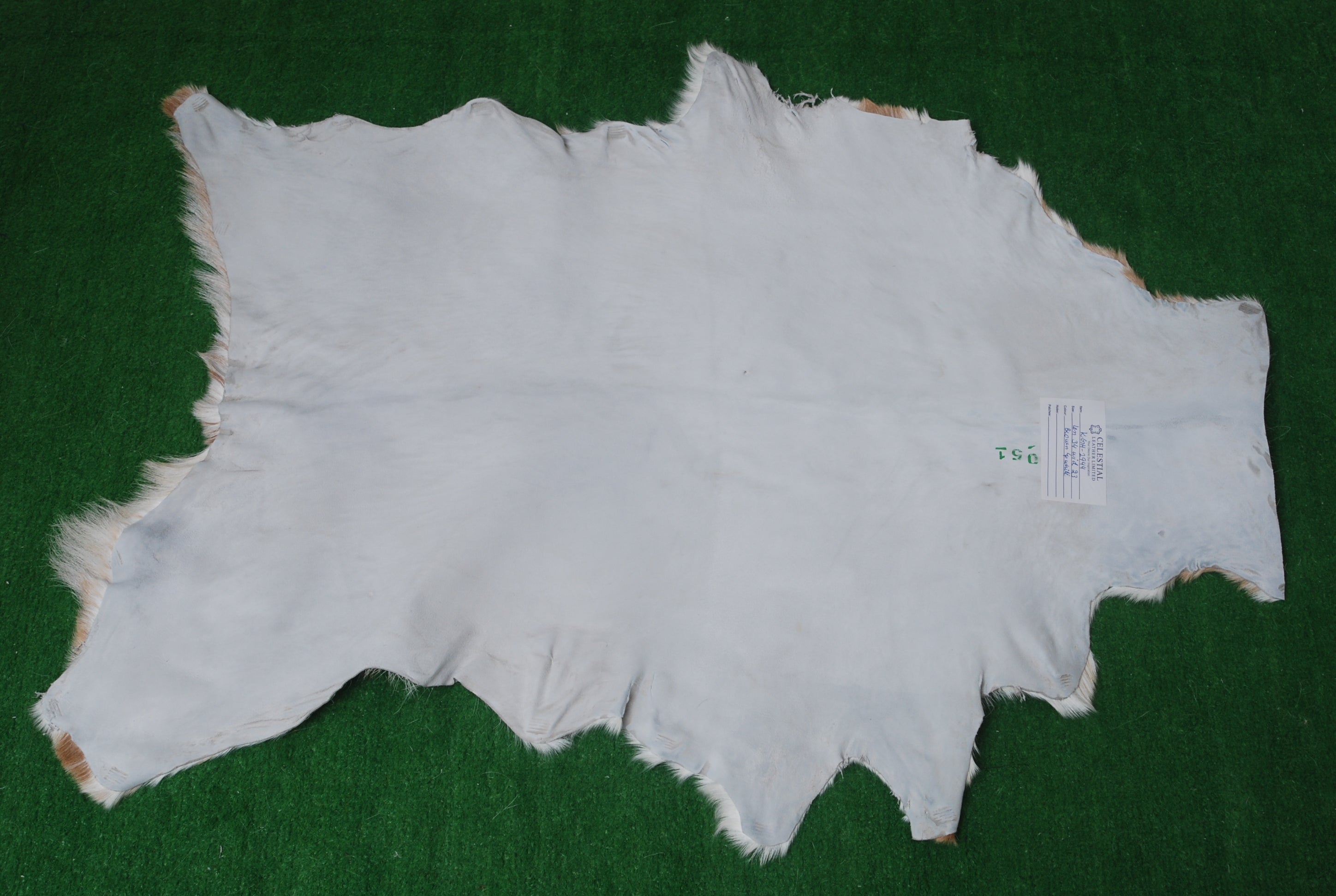 Luxurious Brown & White Goat Skin Rug - Handmade Pure Goat Skin Floor Rug - Unique Design - Hypoallergenic & Kid-Friendly - Non-Shedding - Celestial Leather Limited