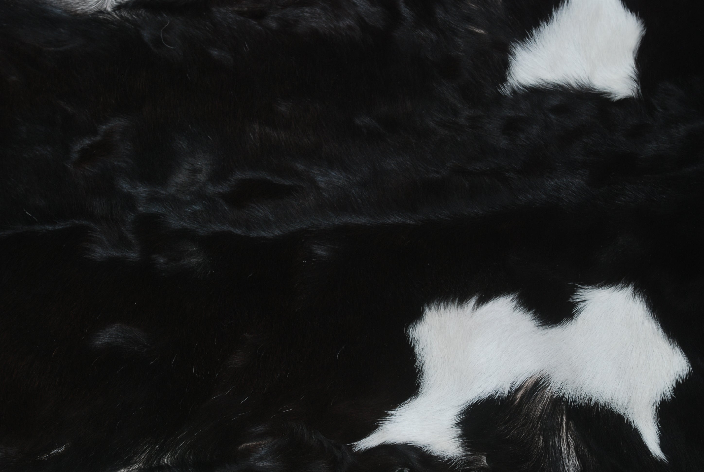 Statement-Making Black & White Goat Hide Rug - Premium Hair-On Goatskin - Modern Sophistication - Natural, Kid - Pet-Friendly