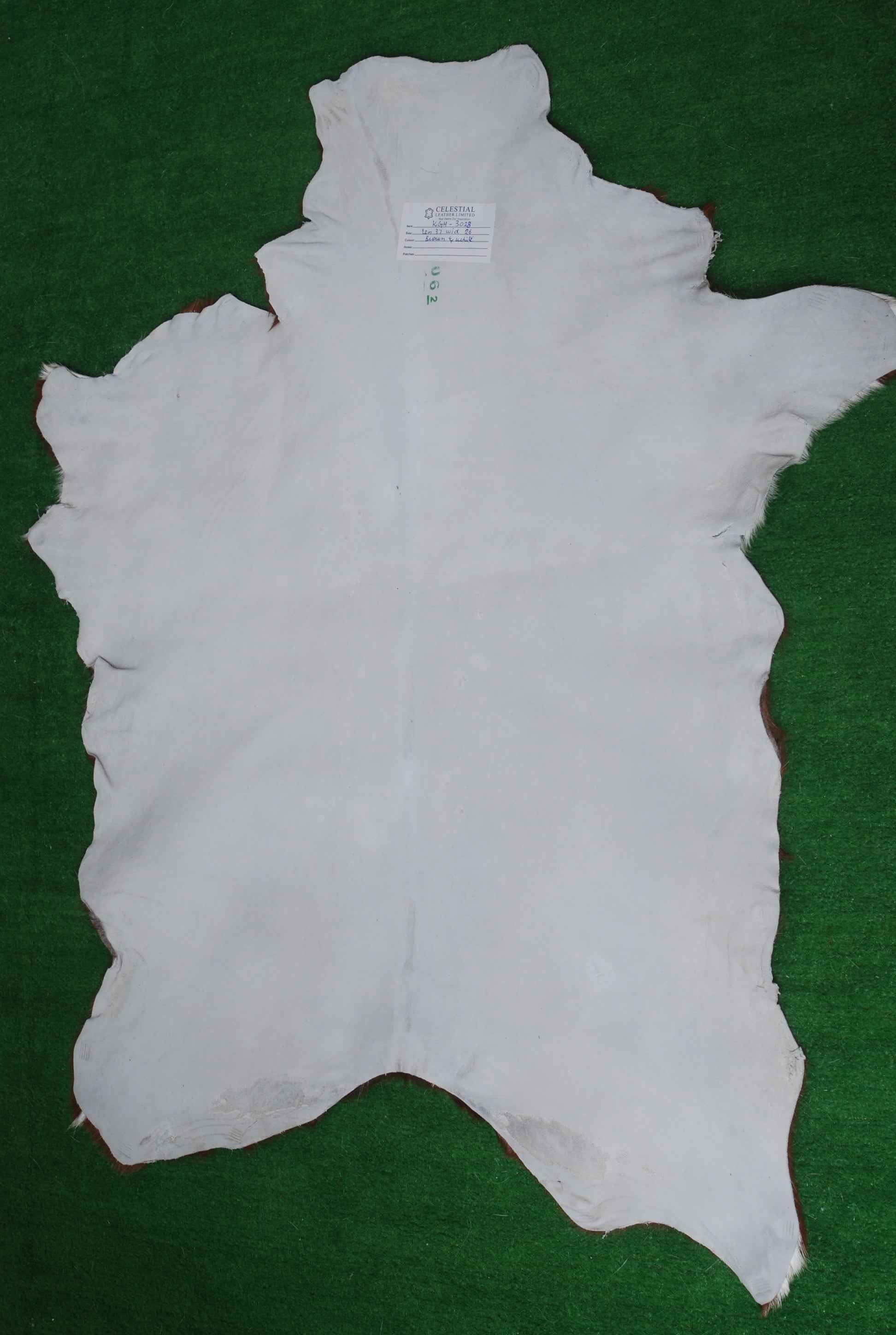 Luxurious Handmade Dark Brown & White Goat Skin Rug - Soft, Durable, Non-Shedding, Eco-Friendly - Unique Statement Piece for Home Décor - Celestial Leather Limited