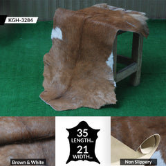 Elegant Brown and White Goat Hide Rug - Perfect Accent for Living Room or Bedroom