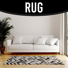 Luxurious Handmade Cowhide Patchwork Area Rug with Zig Zag Stitching - Unique & Practical Home Decor Accent