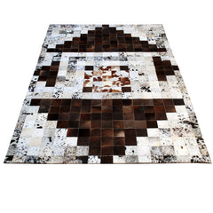 Luxurious Handmade Cowhide Patchwork Rug for Unique Home Decor - Functional & Stylish Genuine Leather Area Rug with Zig Zag Stitching