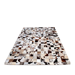 Luxurious Handmade Leather Cowhide Patchwork Rug - Unique Home Décor Accent with Zig Zag Stitching - Natural Cow Skin Area Rug