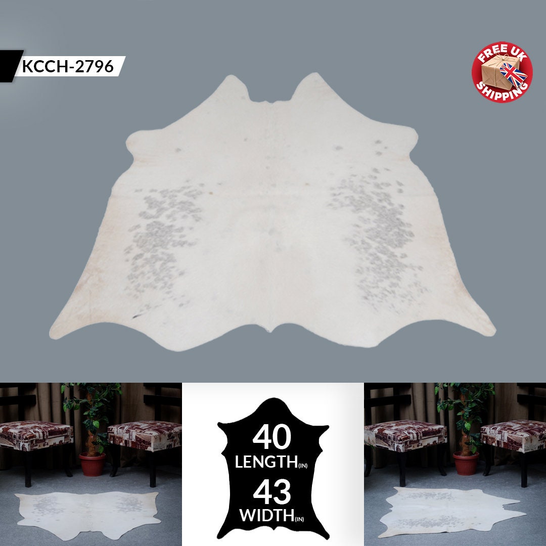 Luxurious Medium Grey and White Cowhide Rug: Hypoallergenic, Non-Slip Backing, Handcrafted from 100% Natural Hides - Unique and Versatile