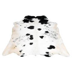 Luxurious Medium Black and White Cowhide Rug | Hypoallergenic, Non-Slip Backing, Handcrafted Quality | Unique Natural Beauty for Bedroom