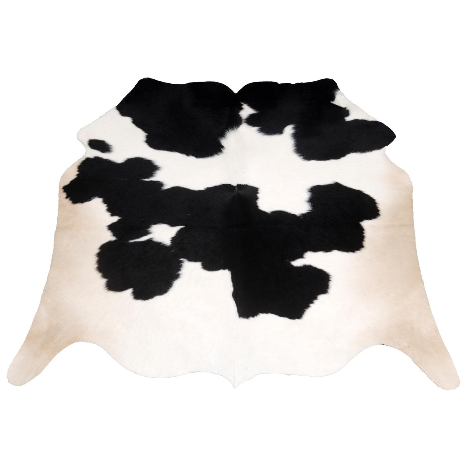 Luxurious Handcrafted Black and White Cowhide Rug - Hypoallergenic, Non-Slip Backing, Unique Markings - Durable and Versatile Home Decor