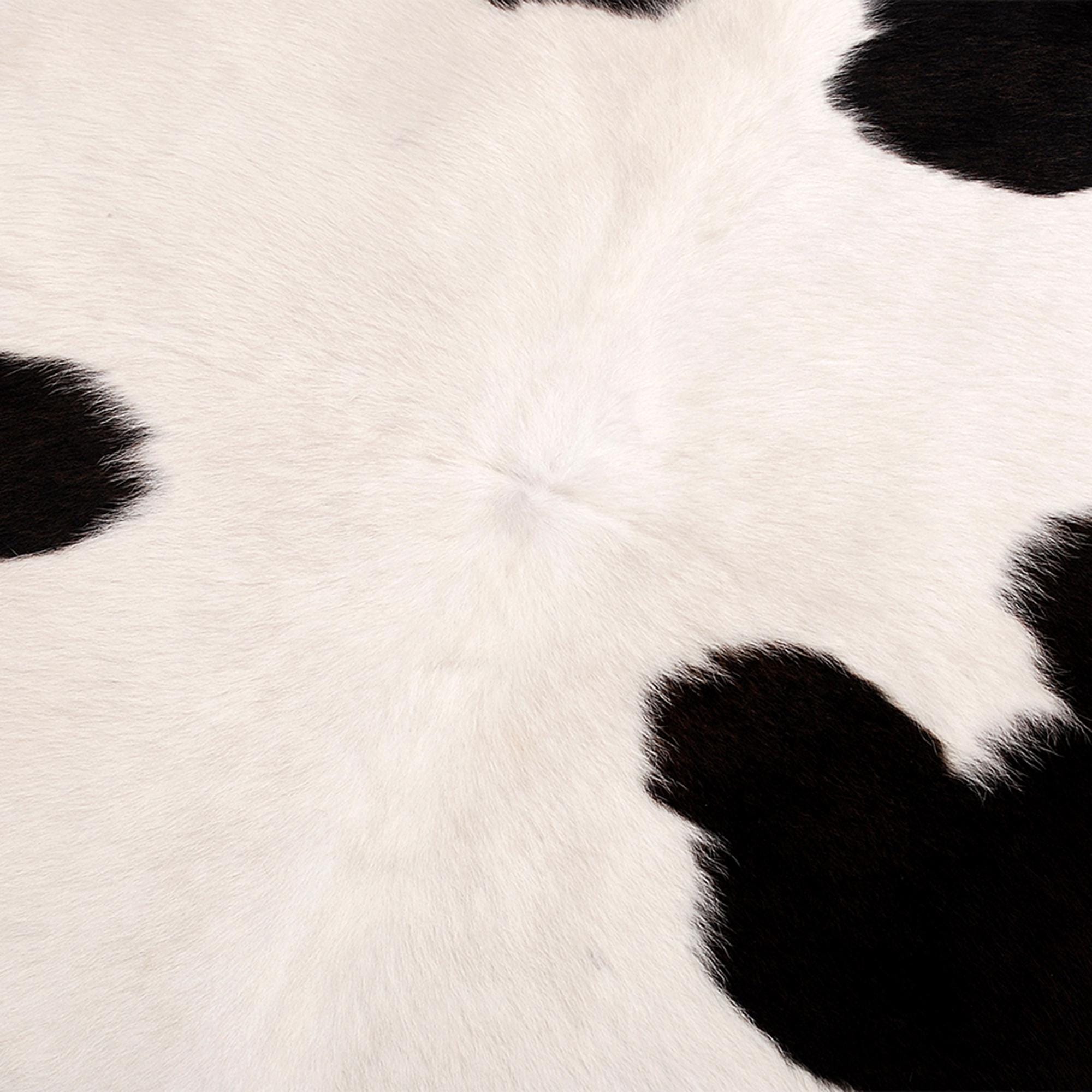Luxurious Handcrafted Brown and White Cowhide Rug with Hypoallergenic Backing - Unique Beauty and Timeless Style for Living Room or Bedroom