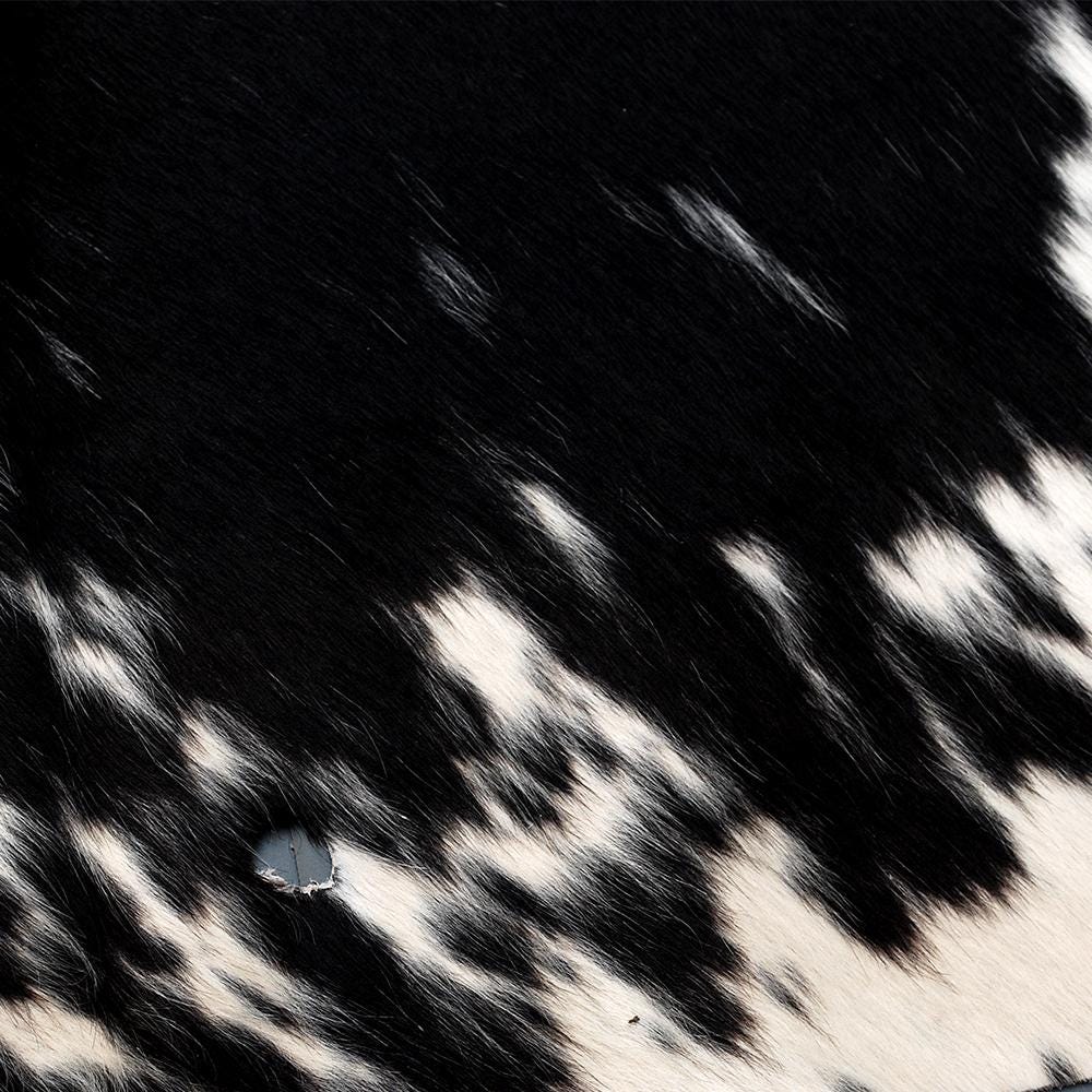 Handpicked Large Animal Print Cowhide Rug with Non-Slip Backing - Hypoallergenic & Luxurious Black - White Centre Piece for Bedroom - Celestial Leather Limited