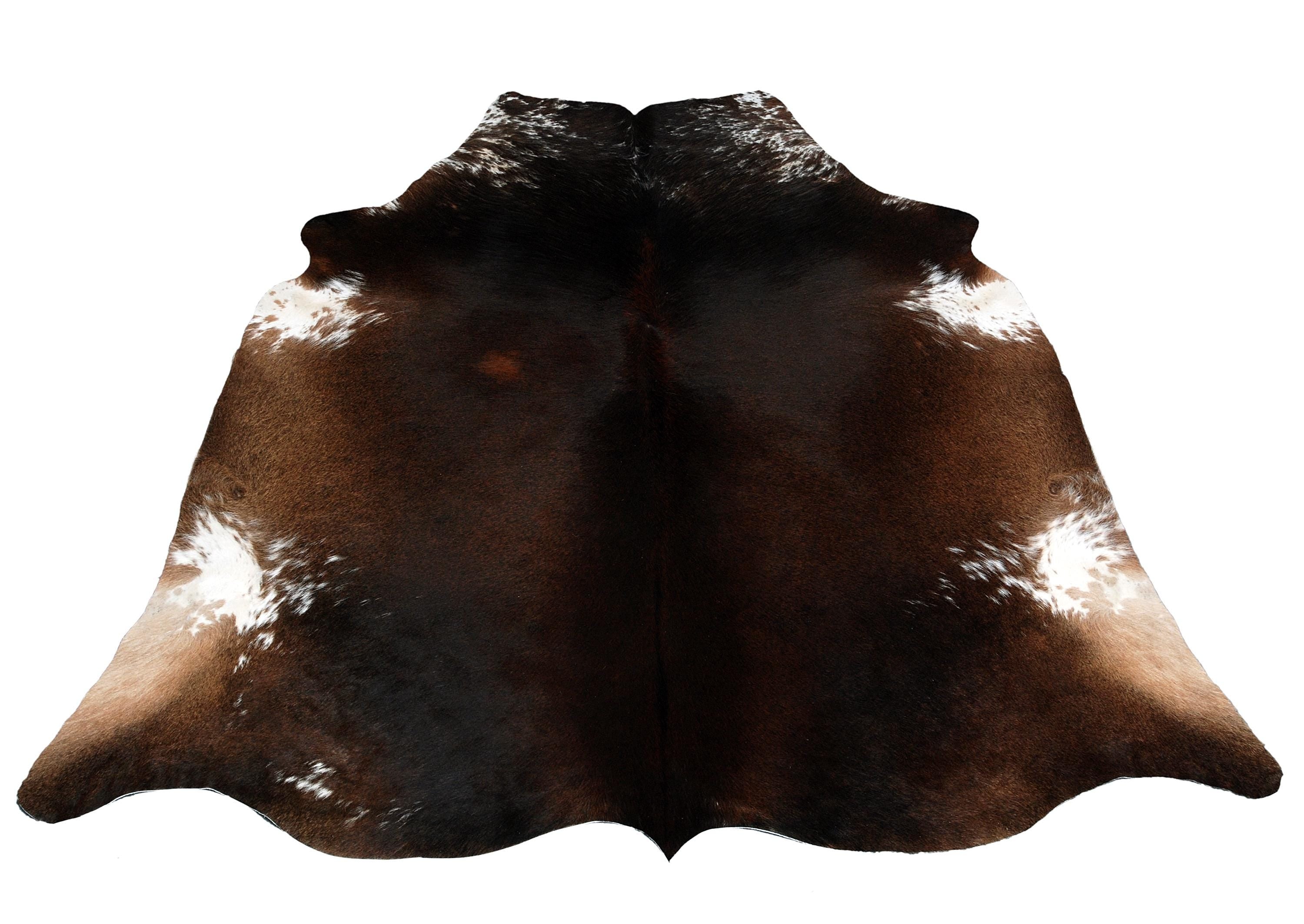 Luxurious Dark Brown and White Cowhide Rug for Sophisticated Lounge Decor - Celestial Leather Limited