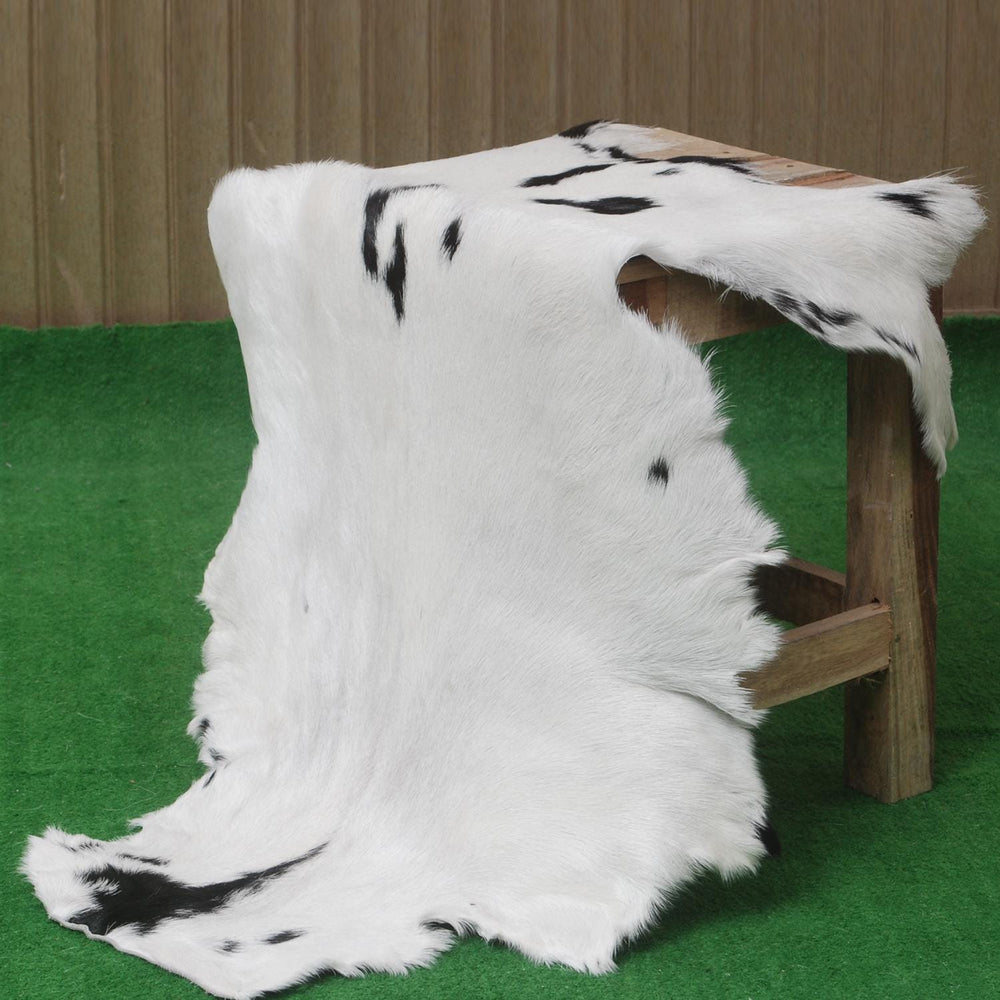 Luxurious Natural Brown & White Goat Skin Rug - Modern Sophistication for Home Decor - Celestial Leather Limited