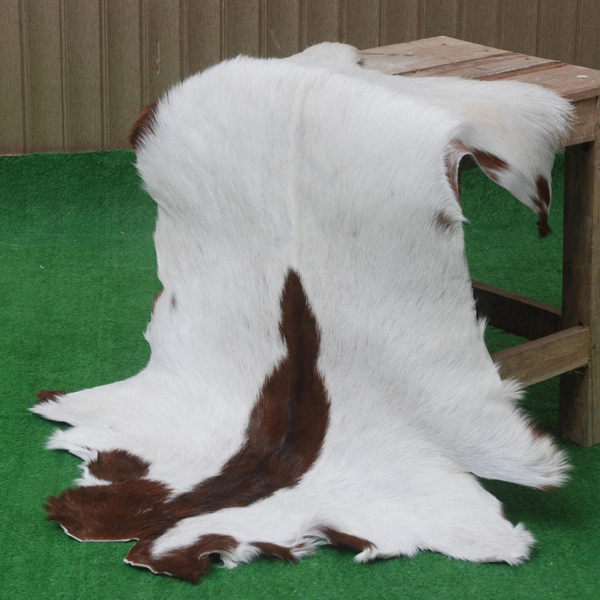 Luxury Brown & White Goat Hide Rug - Premium Hair-on Skin - Eco-Friendly - Hypoallergenic - Handcrafted Elegance for Any Room - Celestial Leather Limited