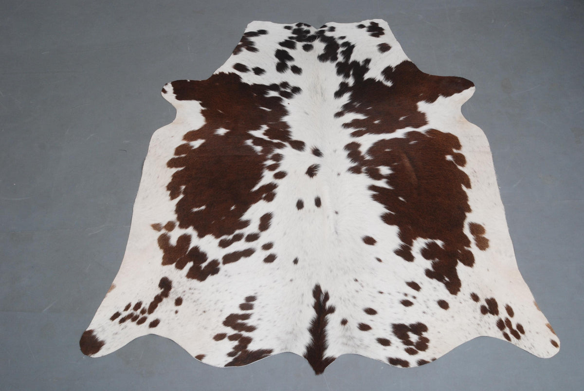 Luxurious Natural Cowhide Rug in Classic Brown and White | Medium Size | Handcrafted with Non-Slip Suede | Unique and Durable Addition to