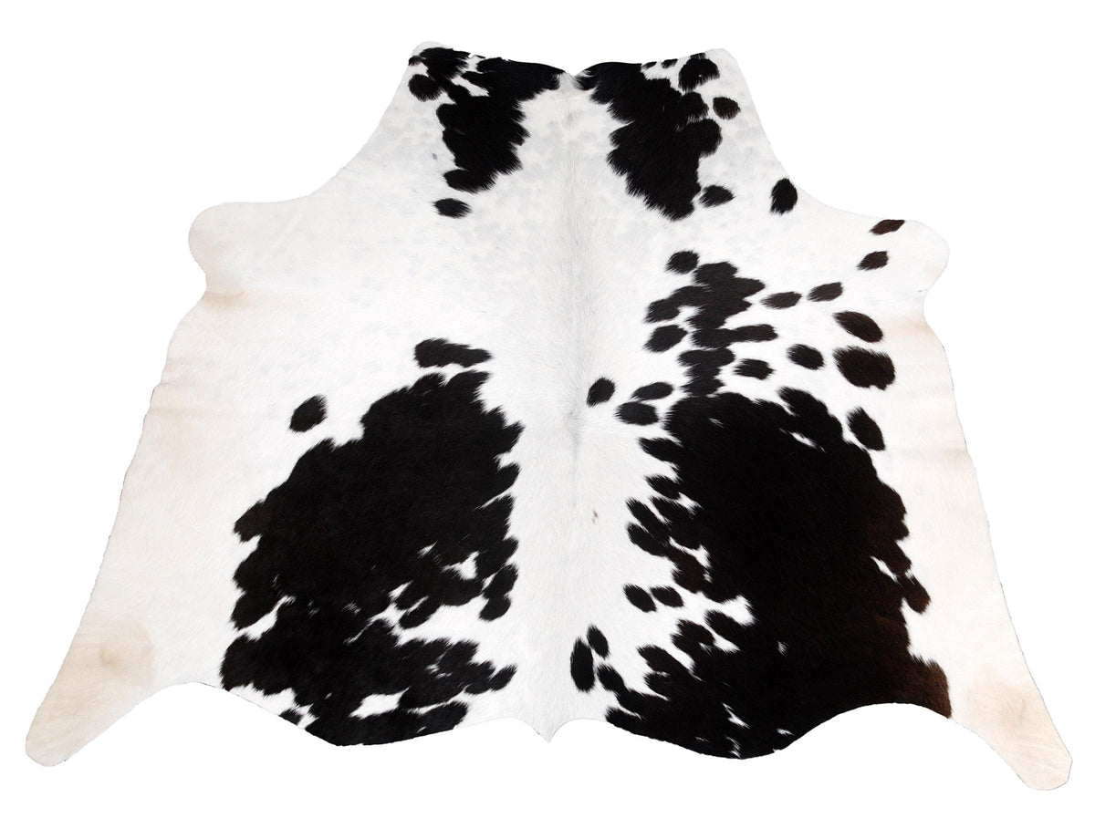 Luxury Handcrafted Cowhide Rug in Bold Black and White - Stunning Home Décor Accent with Hypoallergenic Properties