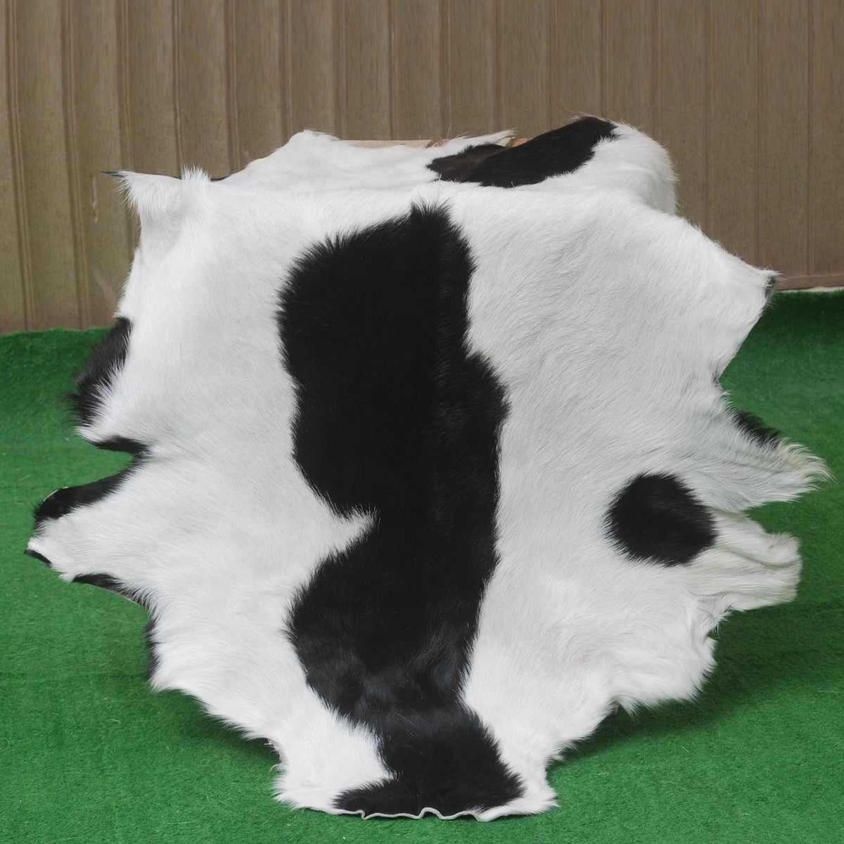 Serene Grey & White Goat Skin Rug - Natural Animal Hide Floor Decor with Suede Back - Sustainable, Eco-Friendly, and Hypoallergenic