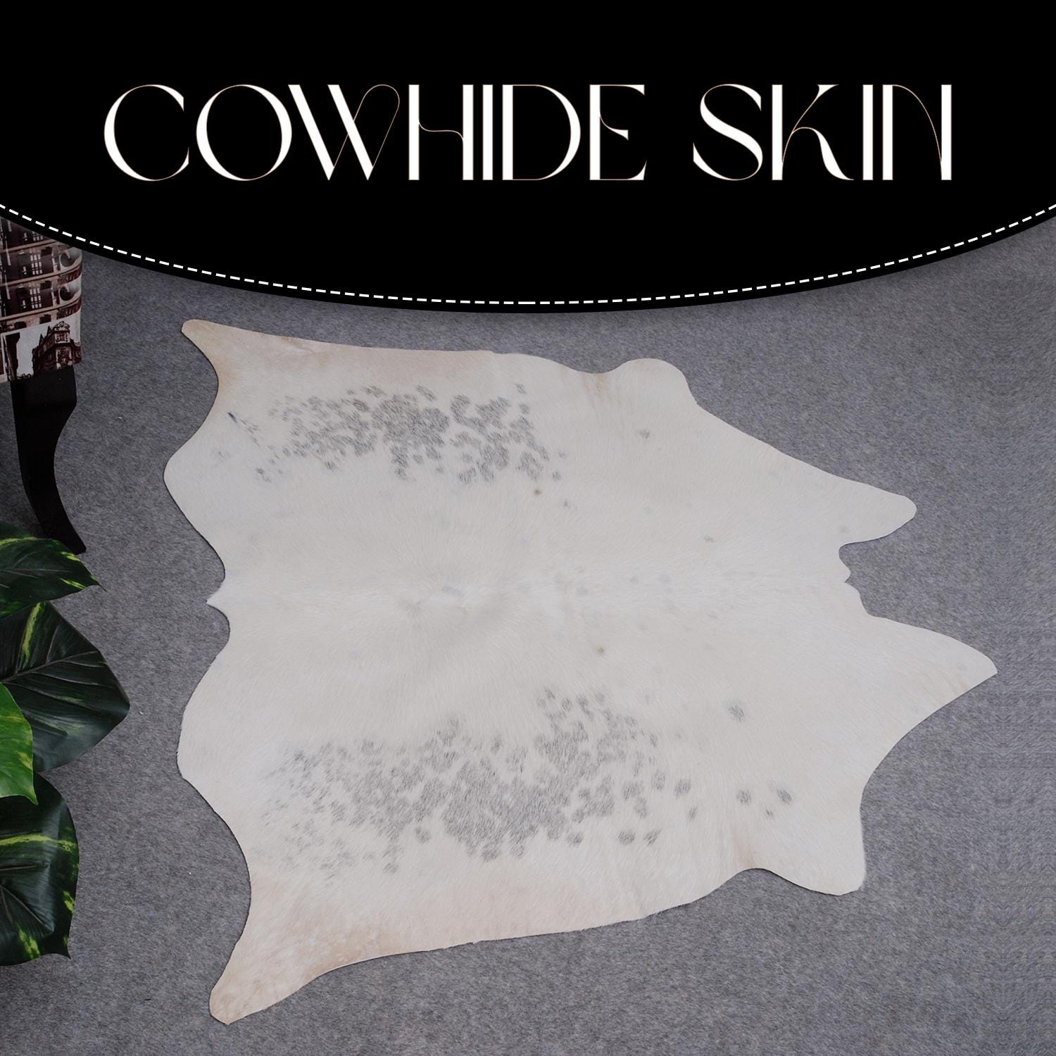 Luxurious Medium Grey and White Cowhide Rug: Hypoallergenic, Non-Slip Backing, Handcrafted from 100% Natural Hides - Unique and Versatile