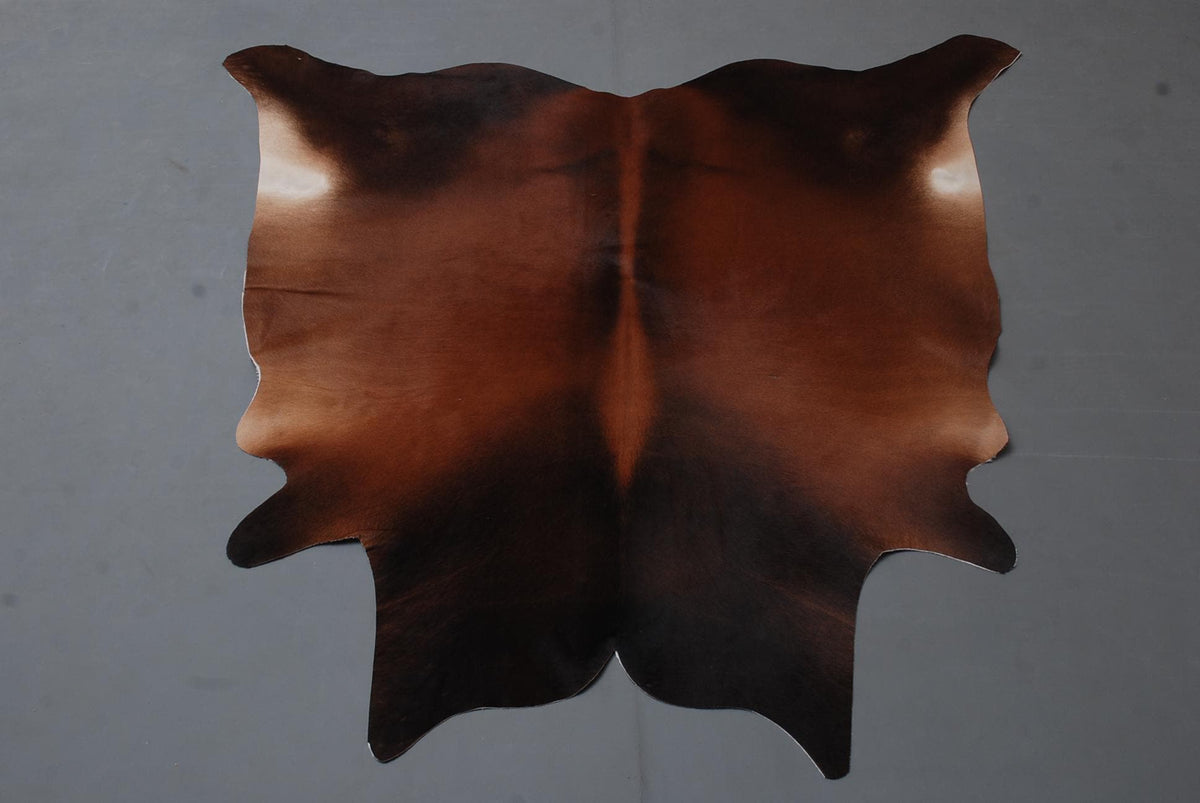 Luxury Natural Cowhide Rug with Brown and White Hair - Hypoallergenic, Handcrafted, Durable, and Unique for Home Decor
